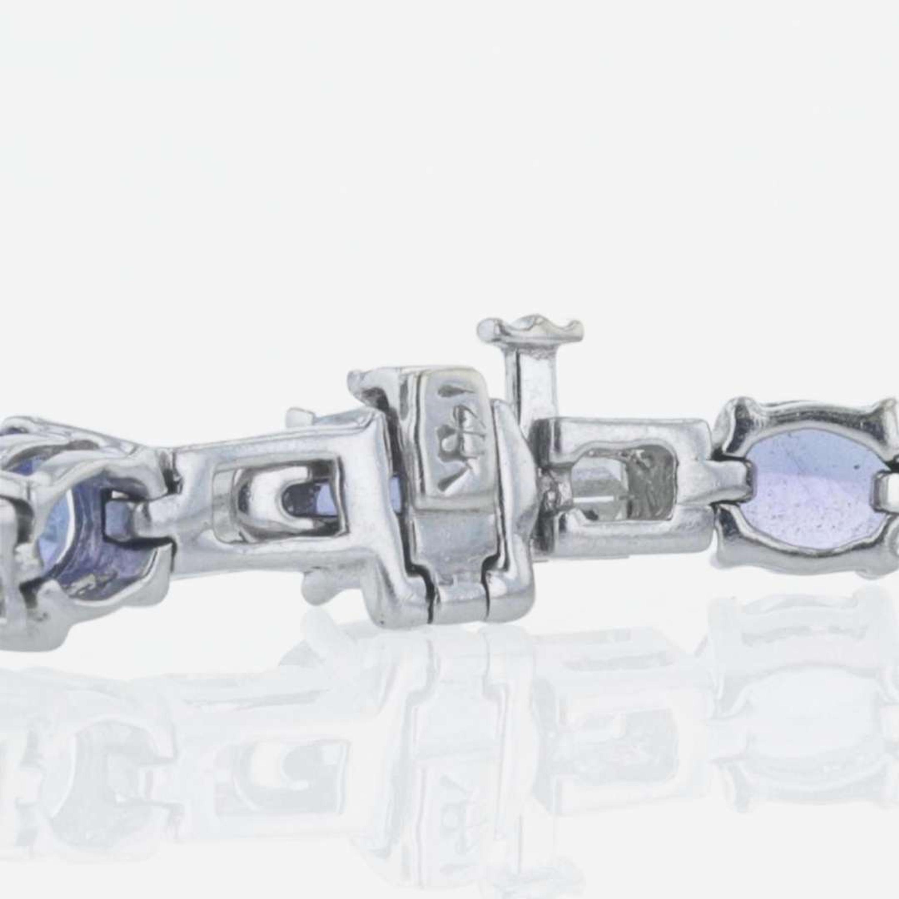 A 14K white gold, tanzanite, and diamond bracelet