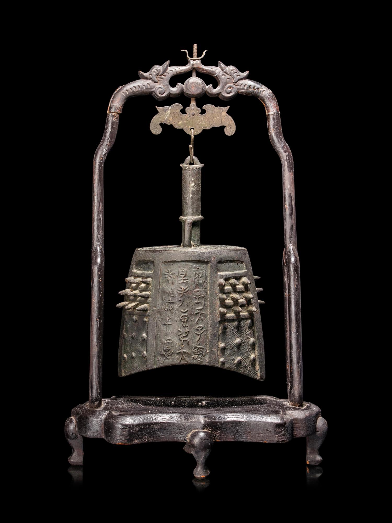 A Chinese Bronze Bell with Stand