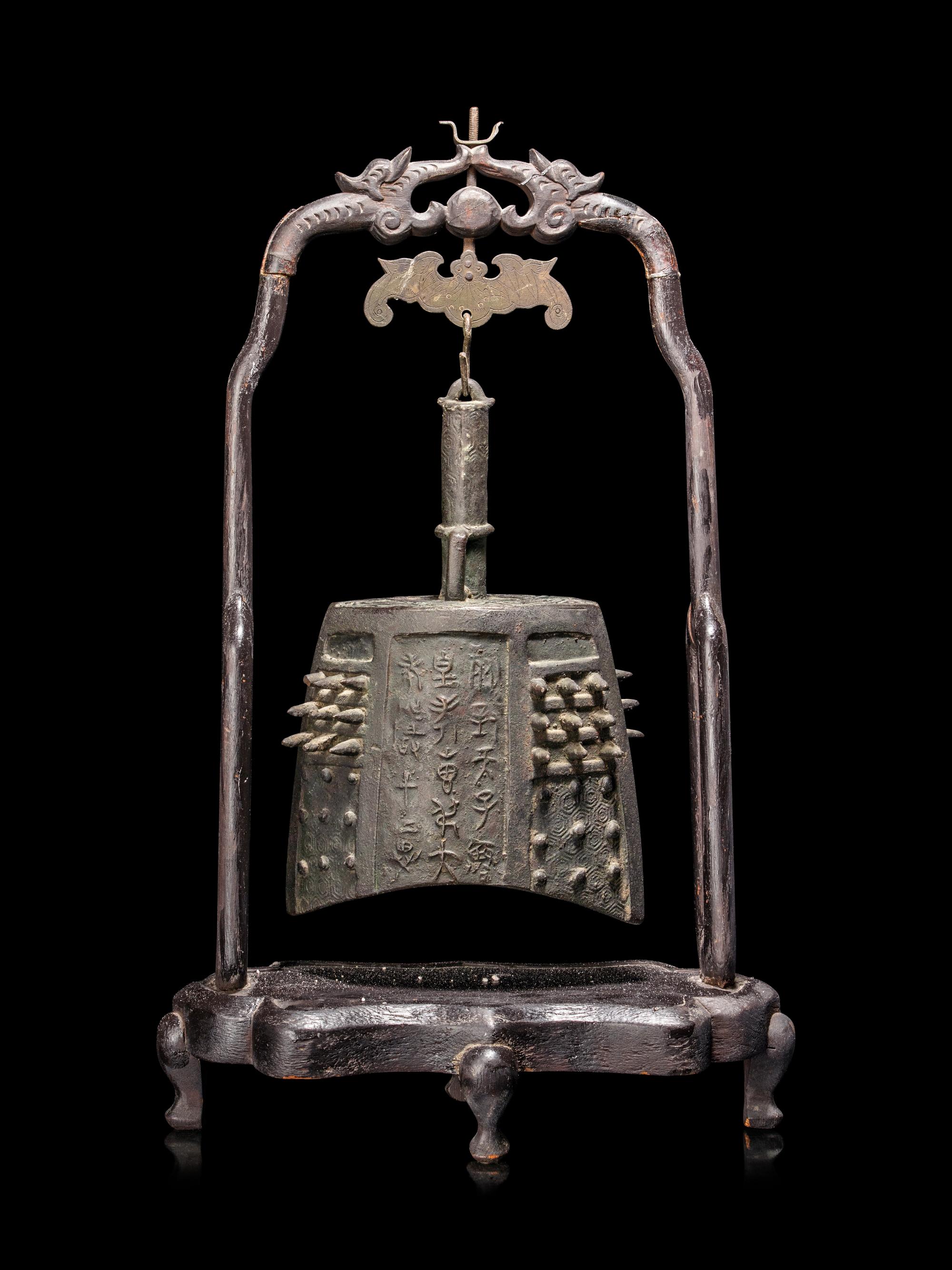 A Chinese Bronze Bell with Stand