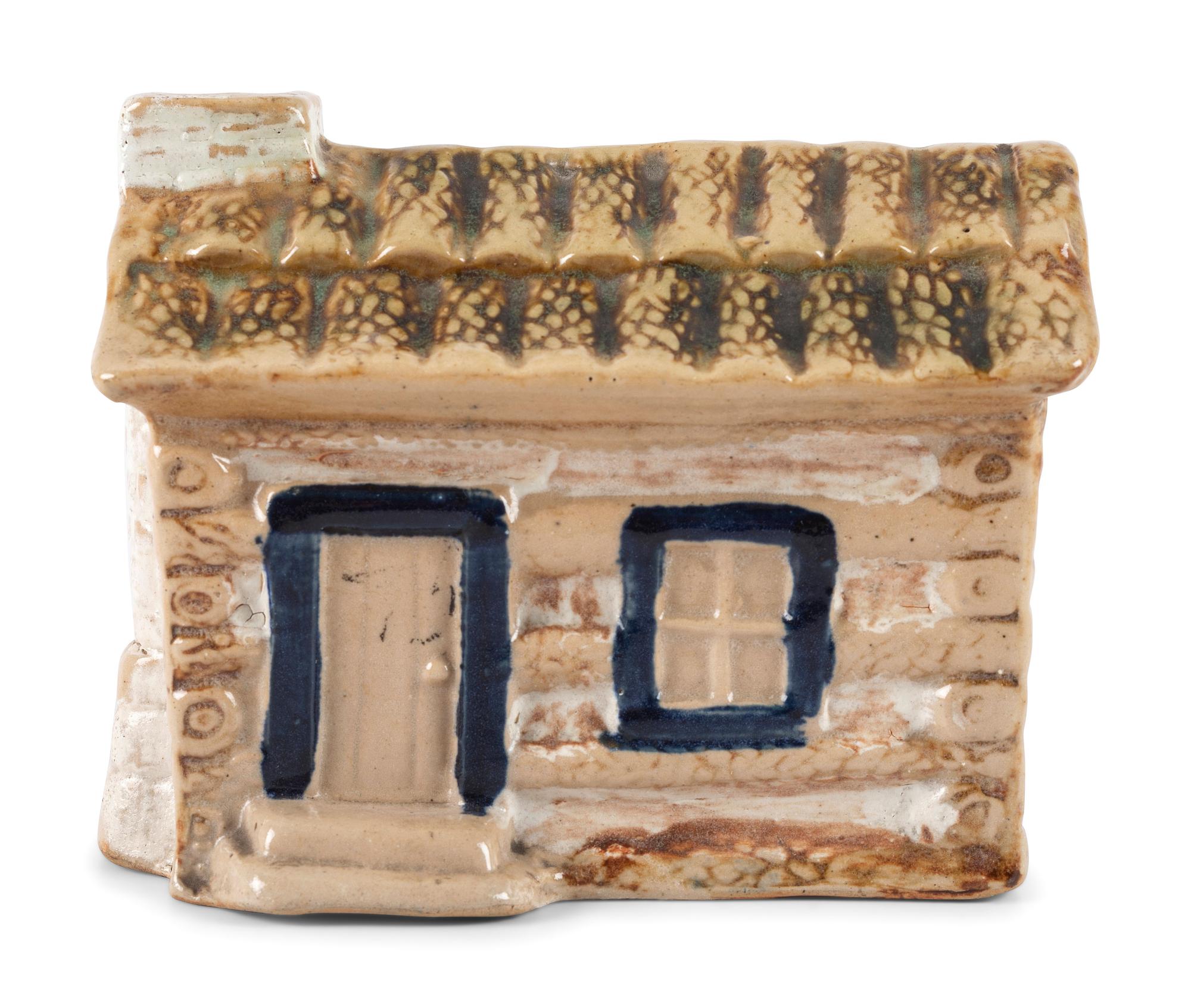A Scarce Dalton Pottery Stoneware Log Cabin Bank