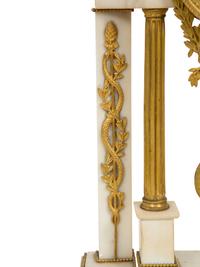 A French Gilt Bronze and White Marble Mantel Clock