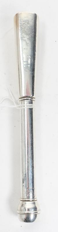 A Cartier Silver Muddler, New York, NY, the tapering square handle with canted corners surmounting a cylindrical stem with a bell-shape