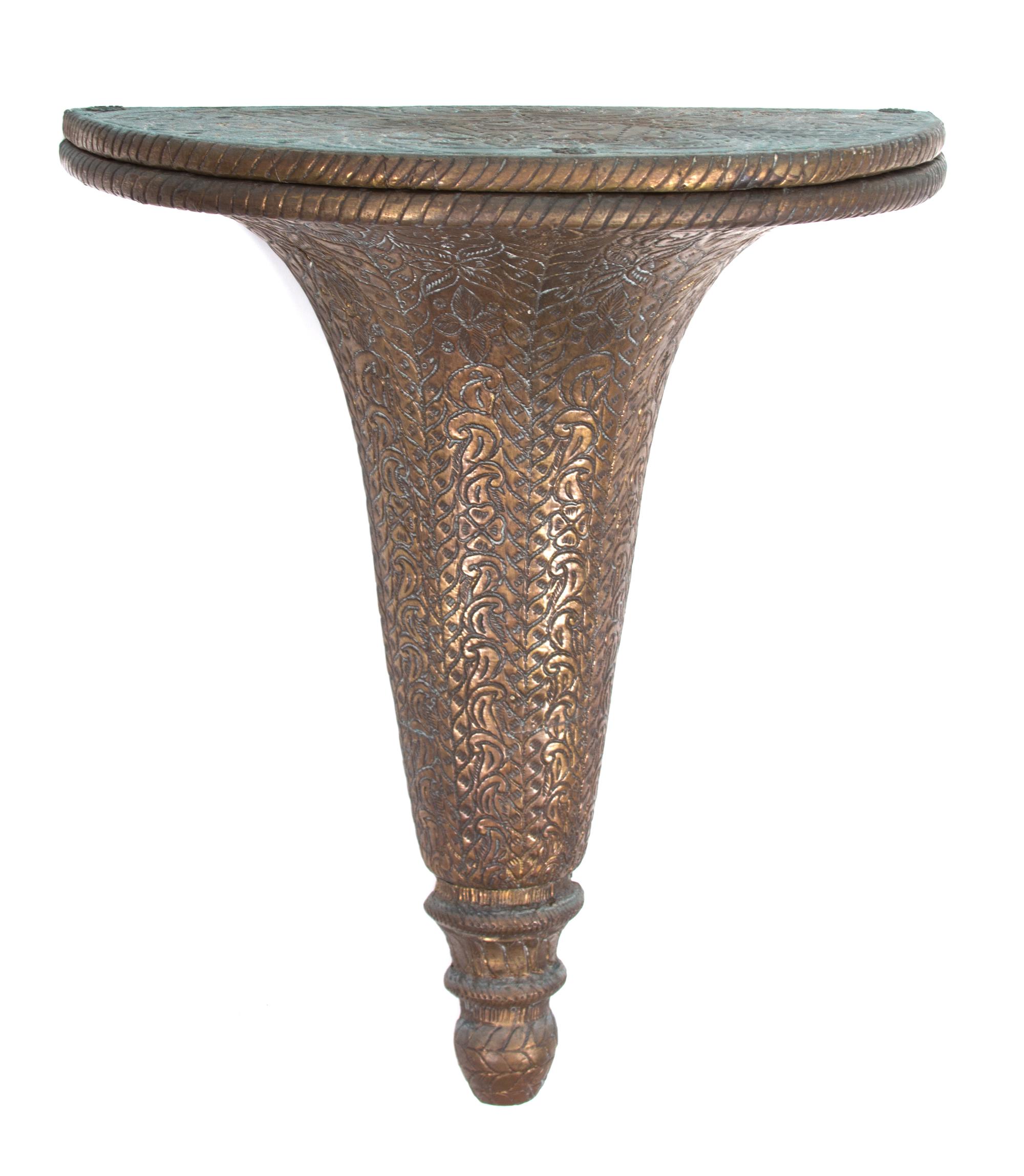 A Continental Stamped Metal Clad Trumpet-Form Wall Bracket Height 22 x width 16 1/2 x depth 8 1/2 inches. — 19TH CENTURY