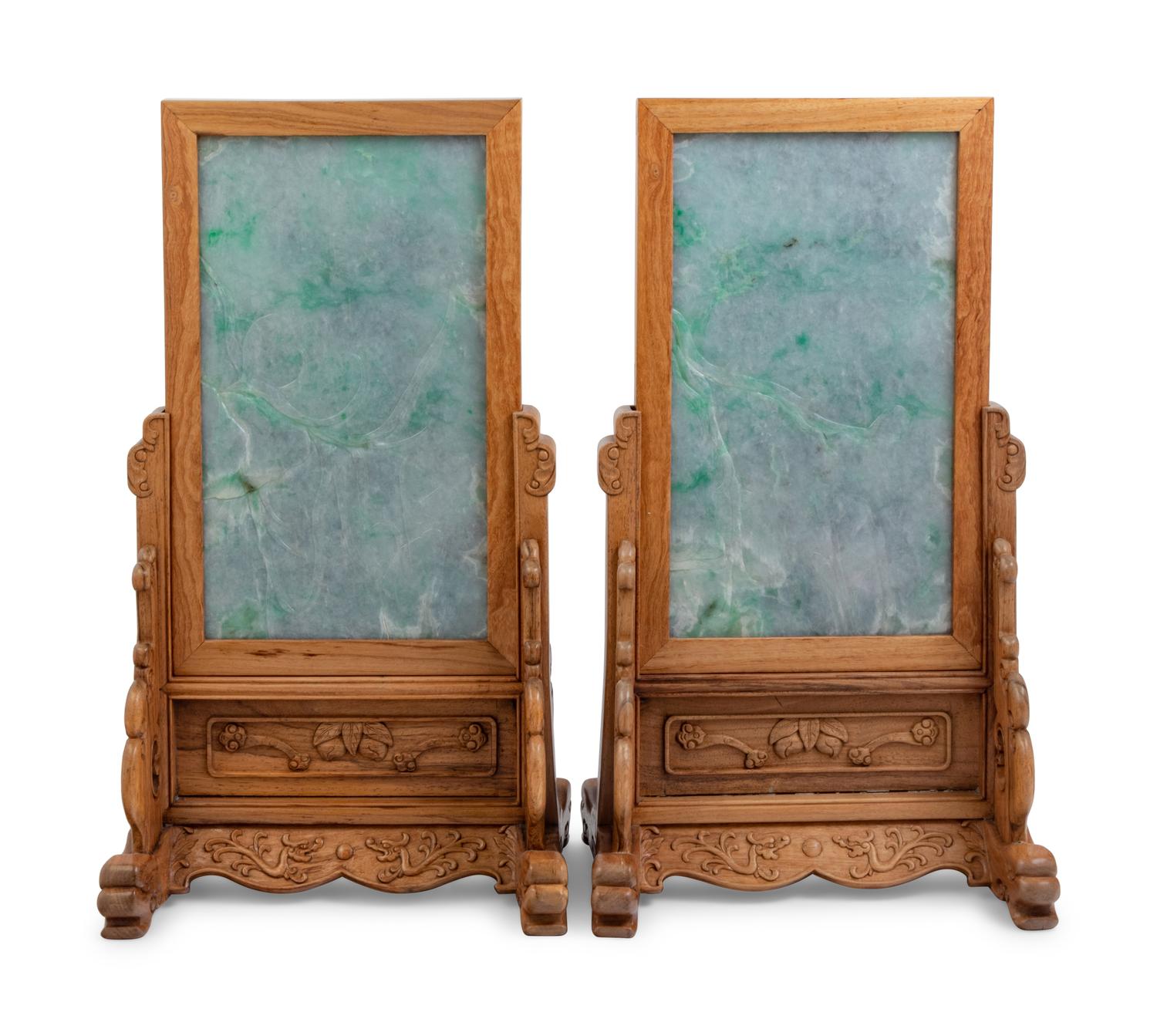 A Set of Four Chinese Export Carved Lavender and Green Jadeite Table Screens in Hardwood Stands
