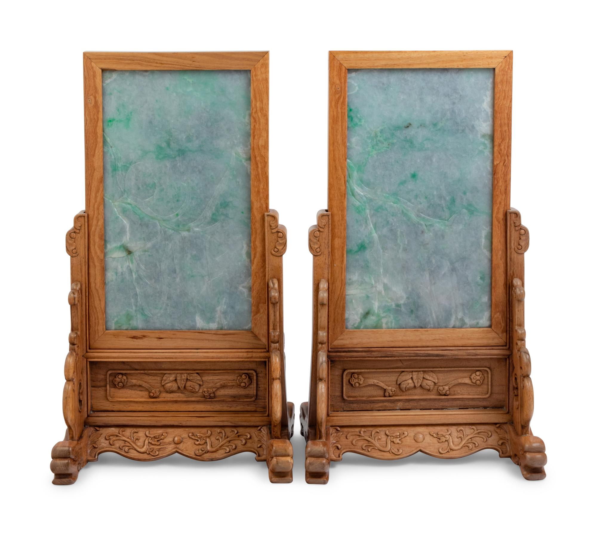 A Set of Four Chinese Export Carved Lavender and Green Jadeite Table Screens in Hardwood Stands