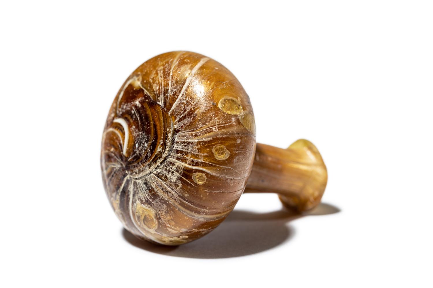 A Roman Marbled Yellow Glass Bottle