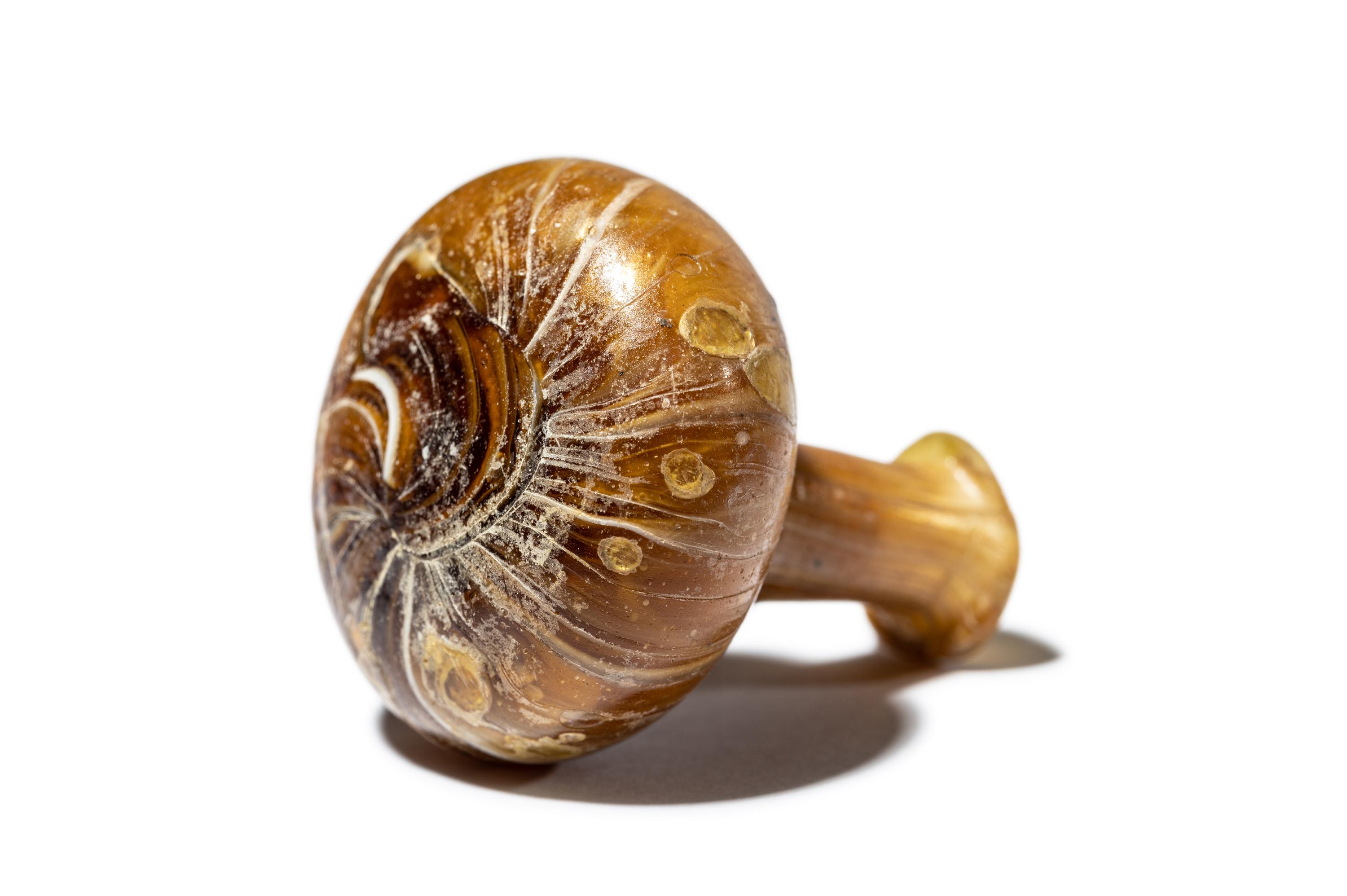 A Roman Marbled Yellow Glass Bottle