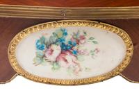 A Louis XV Style Gilt Bronze and Porcelain Mounted Low Table