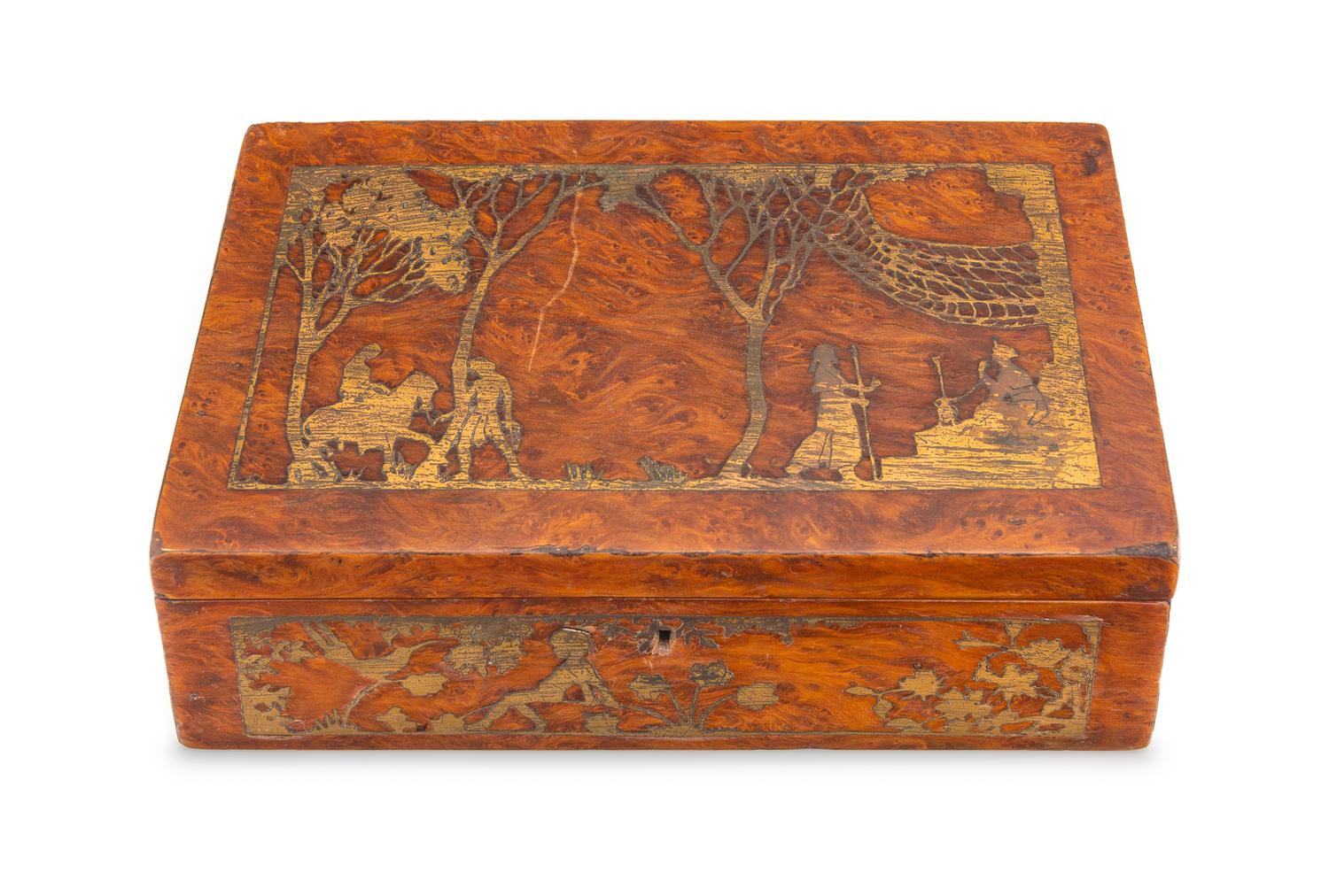 An Arts and Crafts Burlwood and Gilt Metal Inlaid Jewelry Casket Height 2 3/8 x width 7 5/8 x depth 4 1/2 inches. — LATE 19TH CENTURY