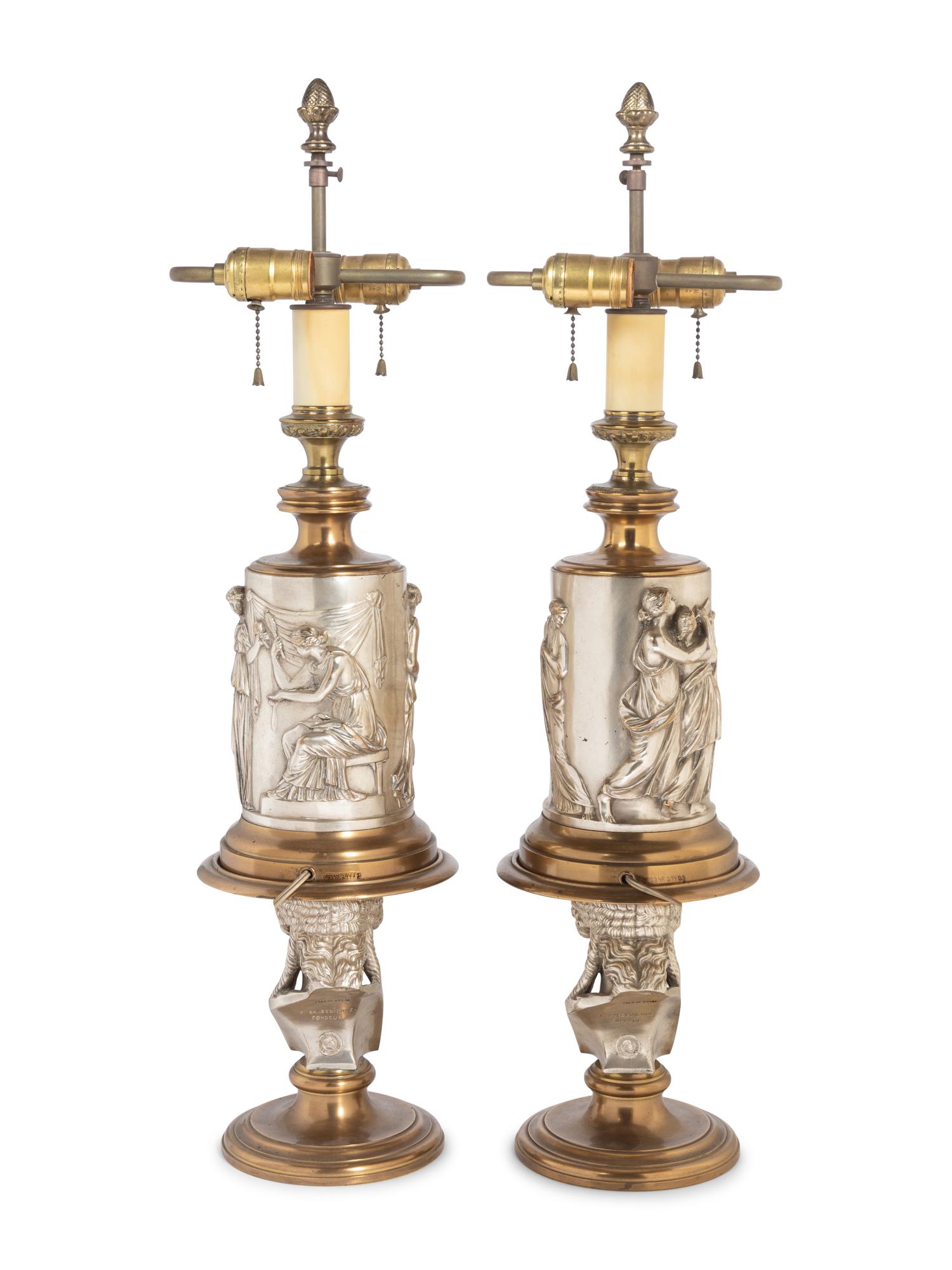 A Pair of Continental Gilt and Silvered Bronze Lamps
