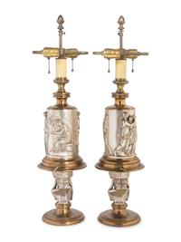 A Pair of Continental Gilt and Silvered Bronze Lamps