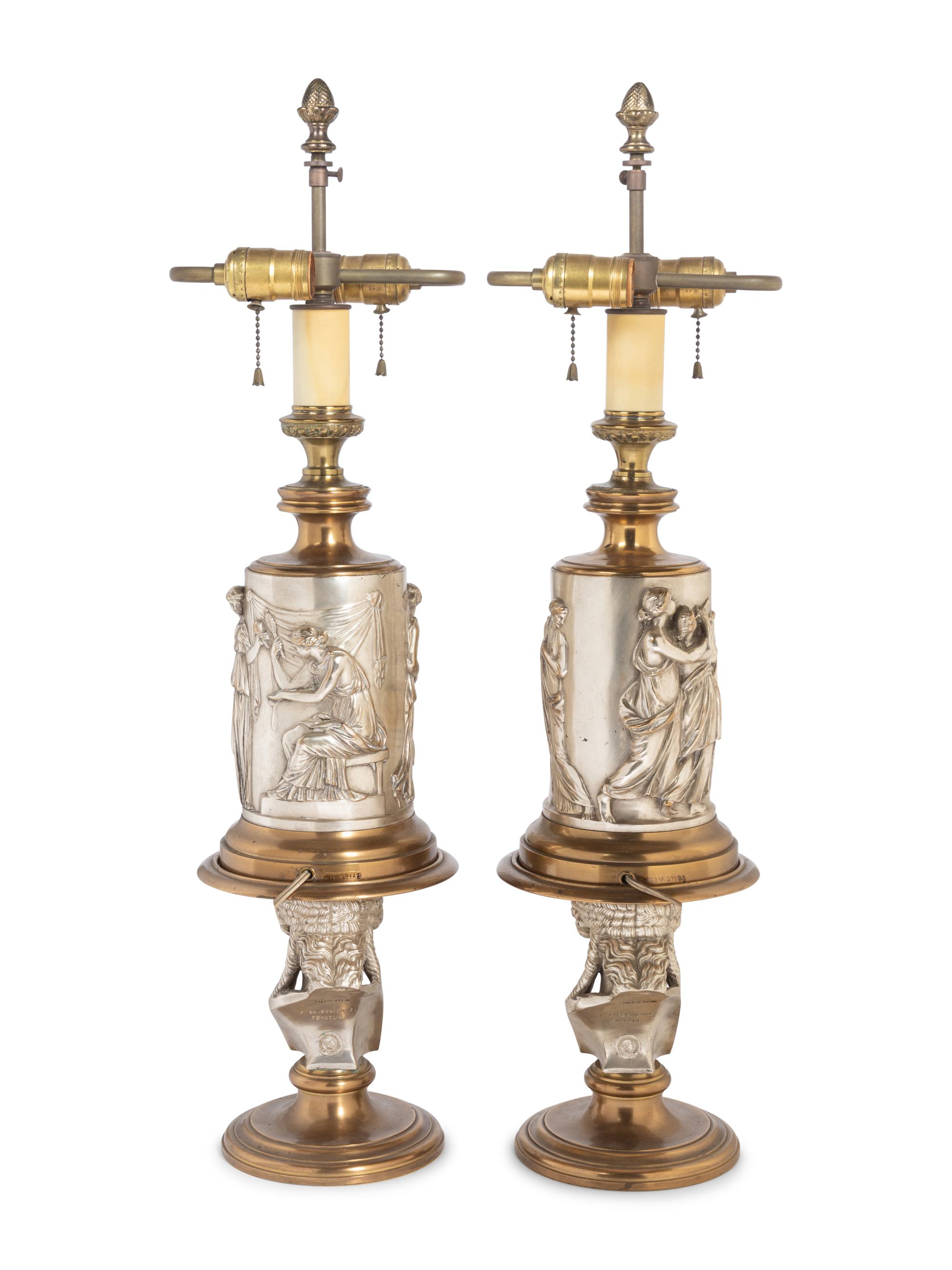 A Pair of Continental Gilt and Silvered Bronze Lamps