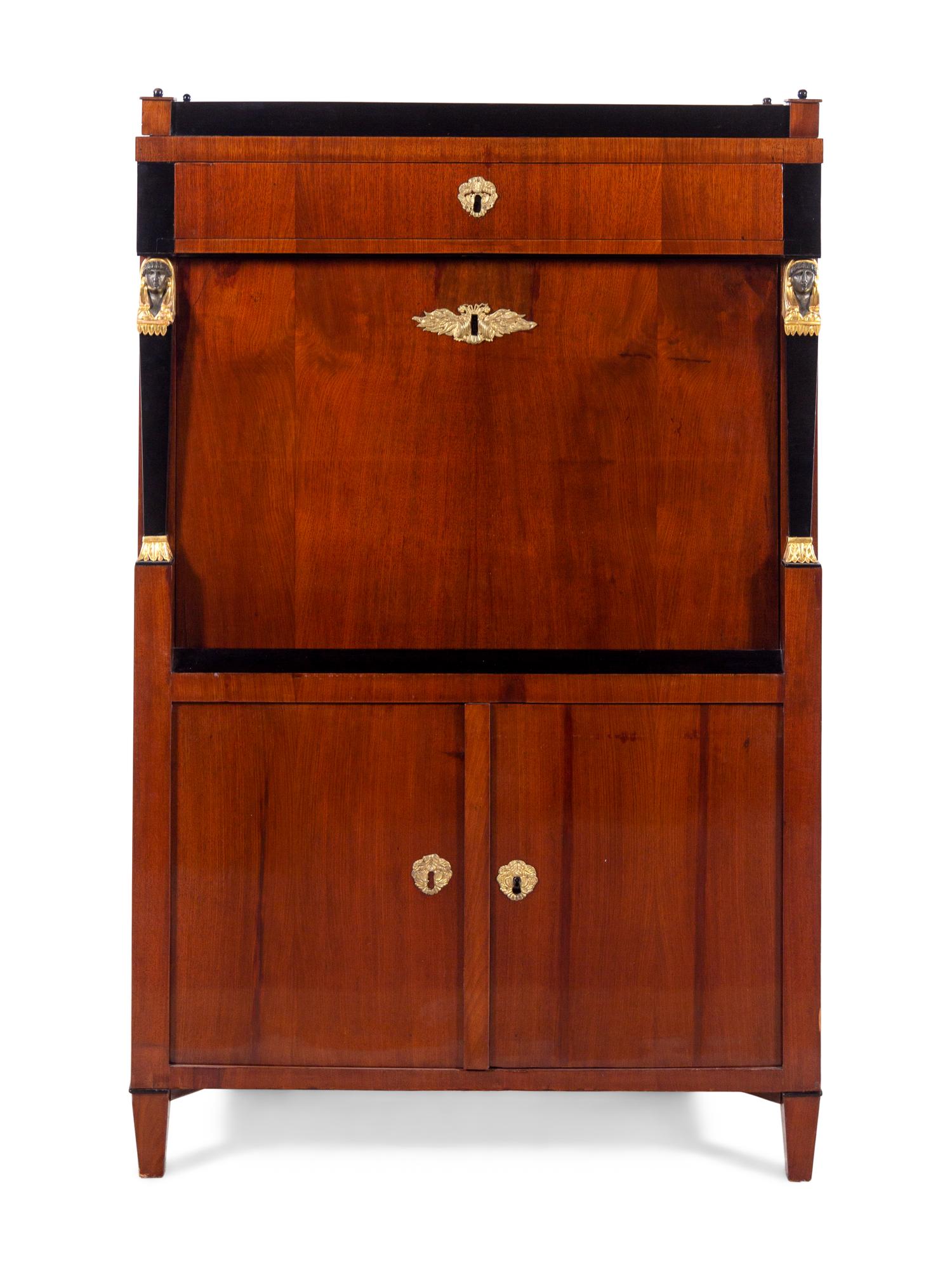 An Austrian Empire Parcel Ebonized and Gilt Mahogany Secrétaire à Abattant