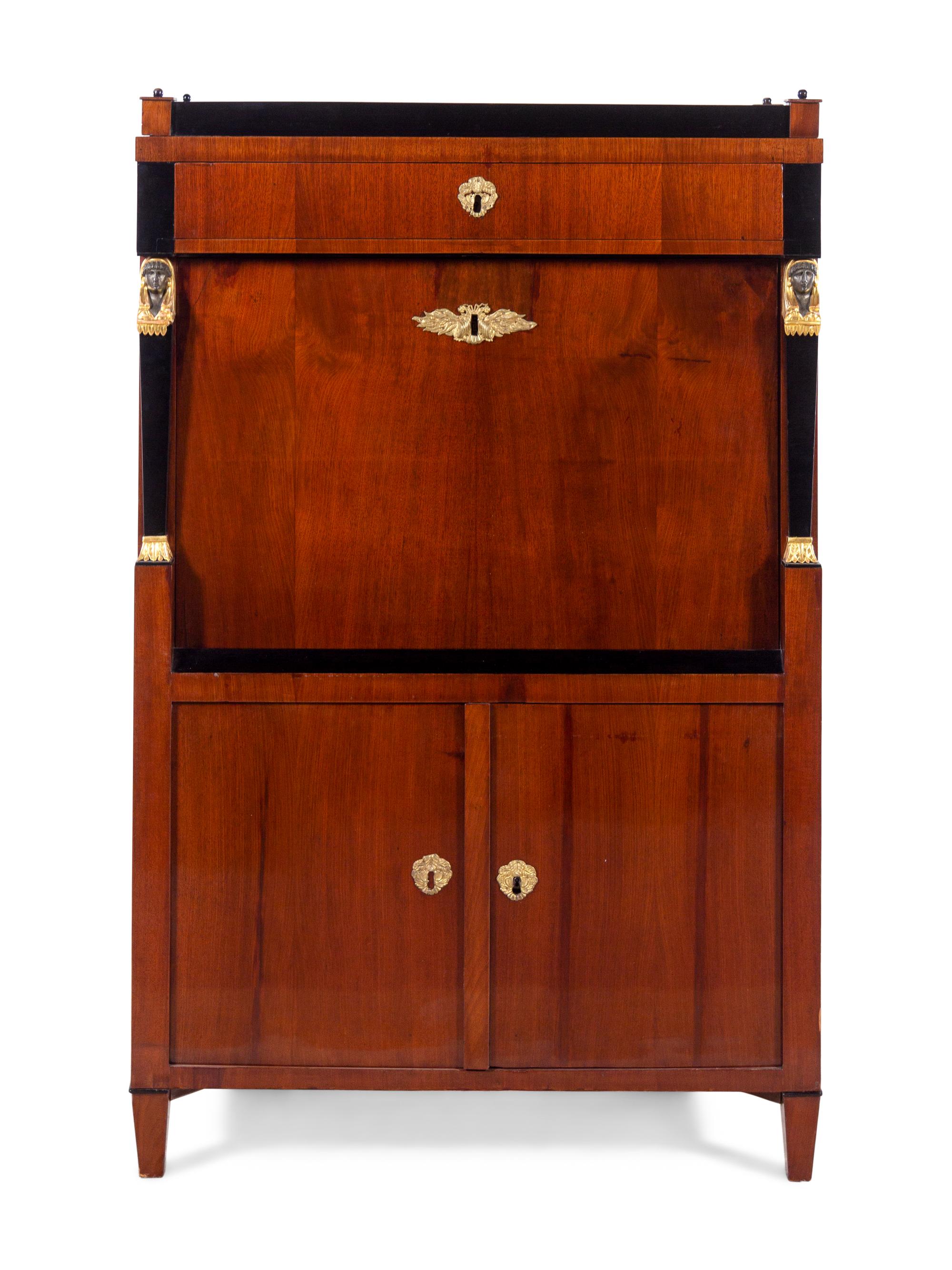 An Austrian Empire Parcel Ebonized and Gilt Mahogany Secrétaire à Abattant