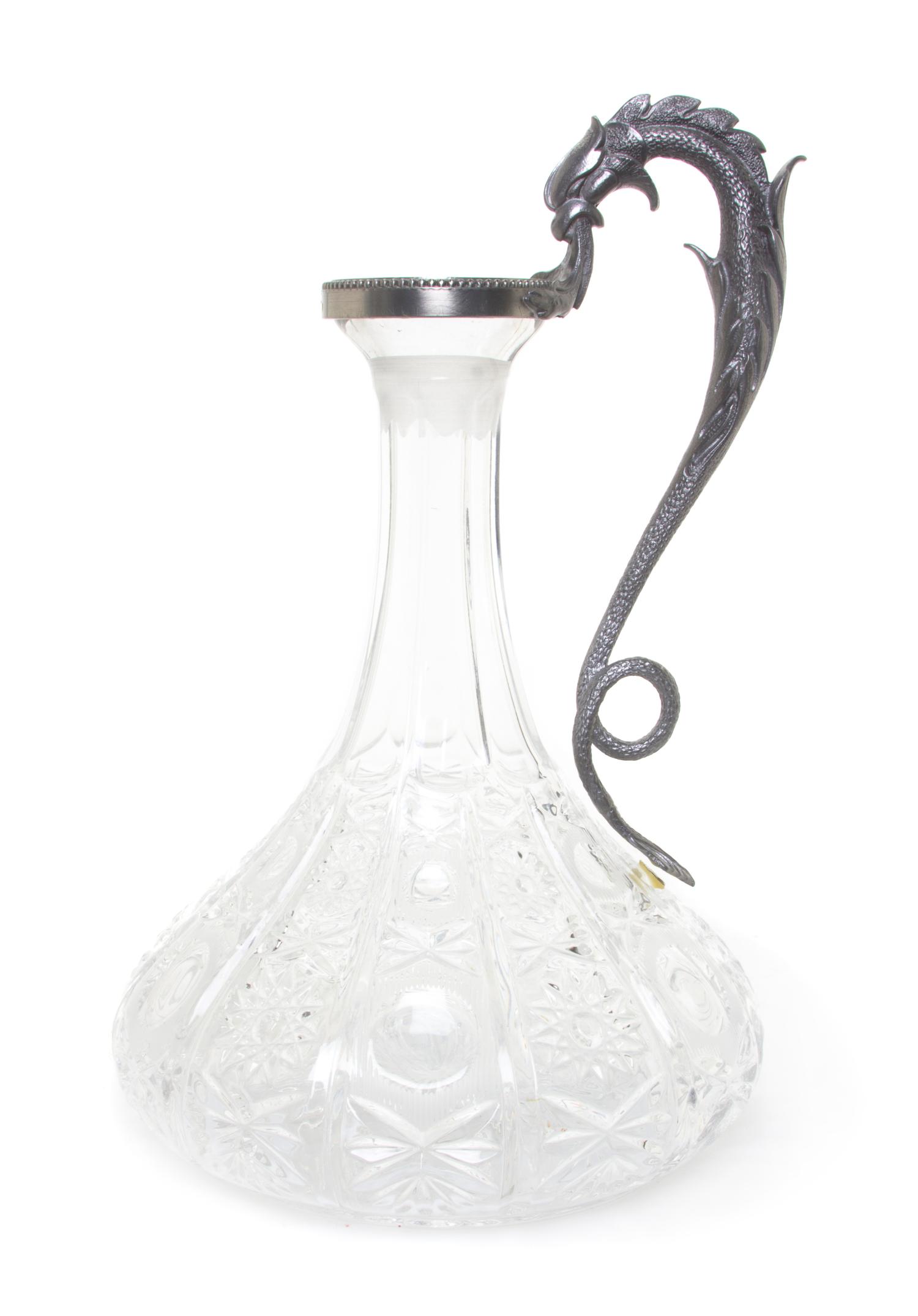 An American Metal Mounted Brilliant Cut Glass Ship's Decanter, Height 11 1/8 inches.