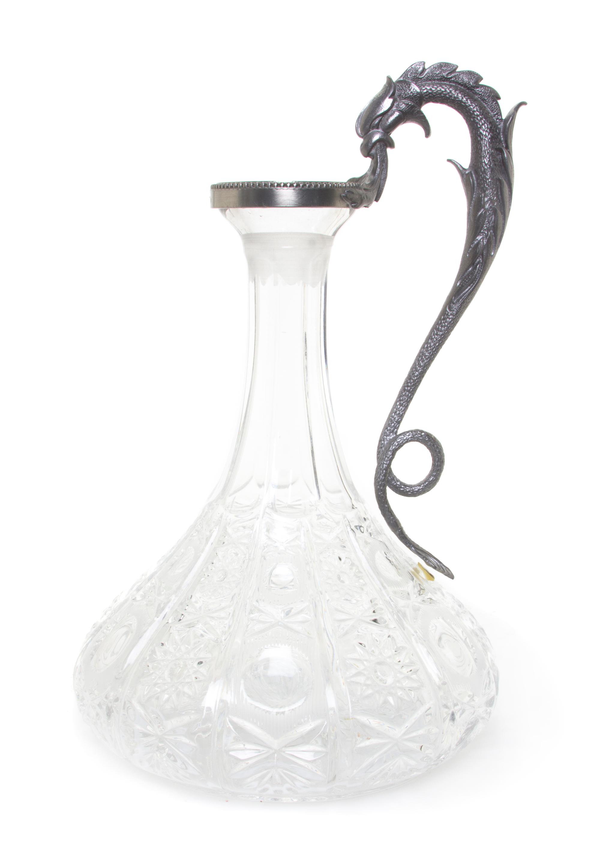An American Metal Mounted Brilliant Cut Glass Ship's Decanter, Height 11 1/8 inches.