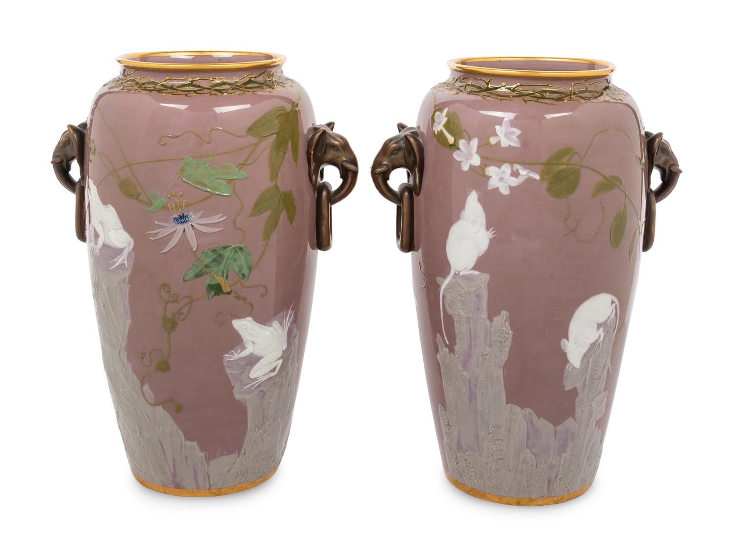 A Pair of Mintons Pate-sur-Pate Elephant Handle Urns