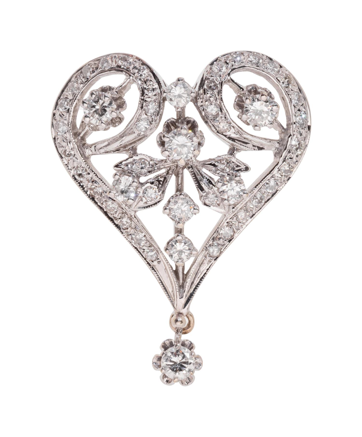 A 14 Karat White Gold and Diamond Pendant/Brooch,