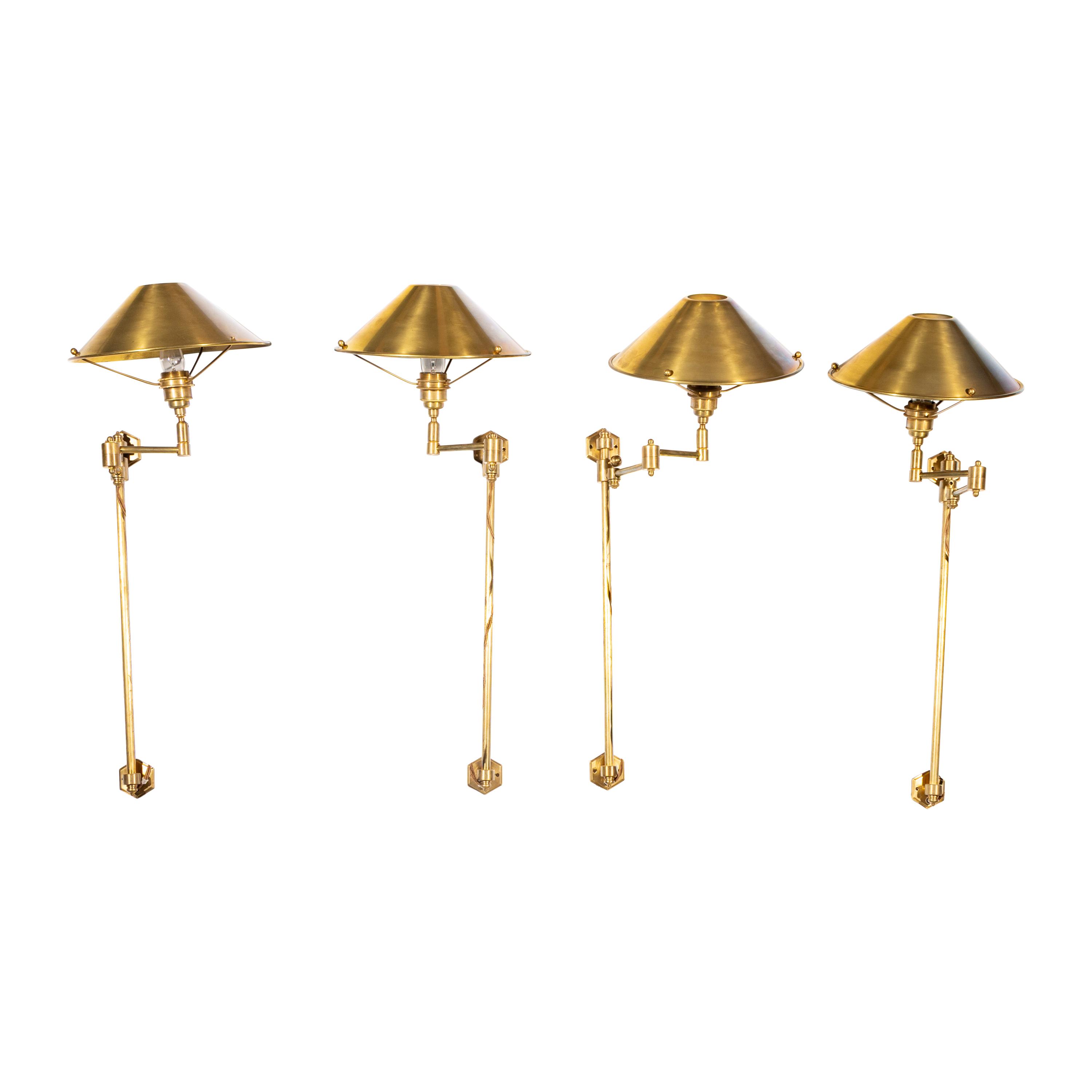 Two Pairs of Besselink and Jones Brass Swivel-Arm Library Lights
