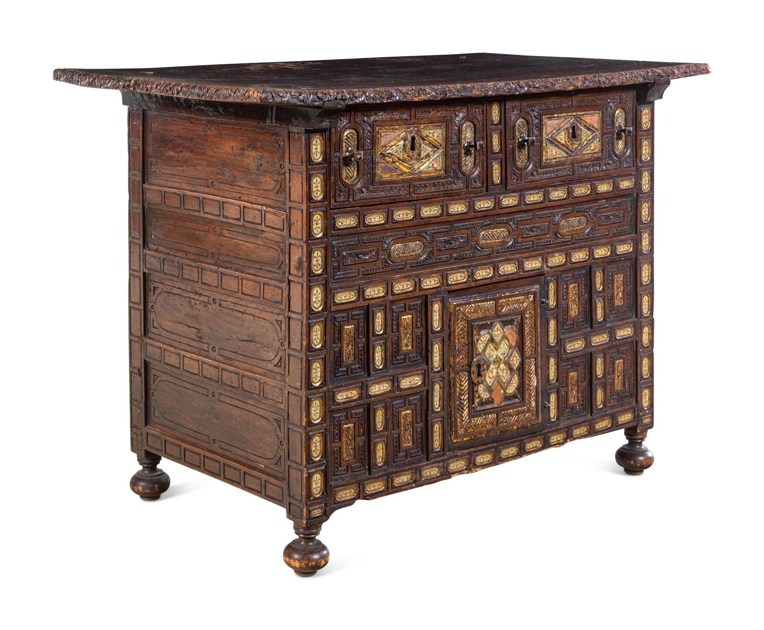 A Spanish Baroque Carved and Painted Walnut Chest