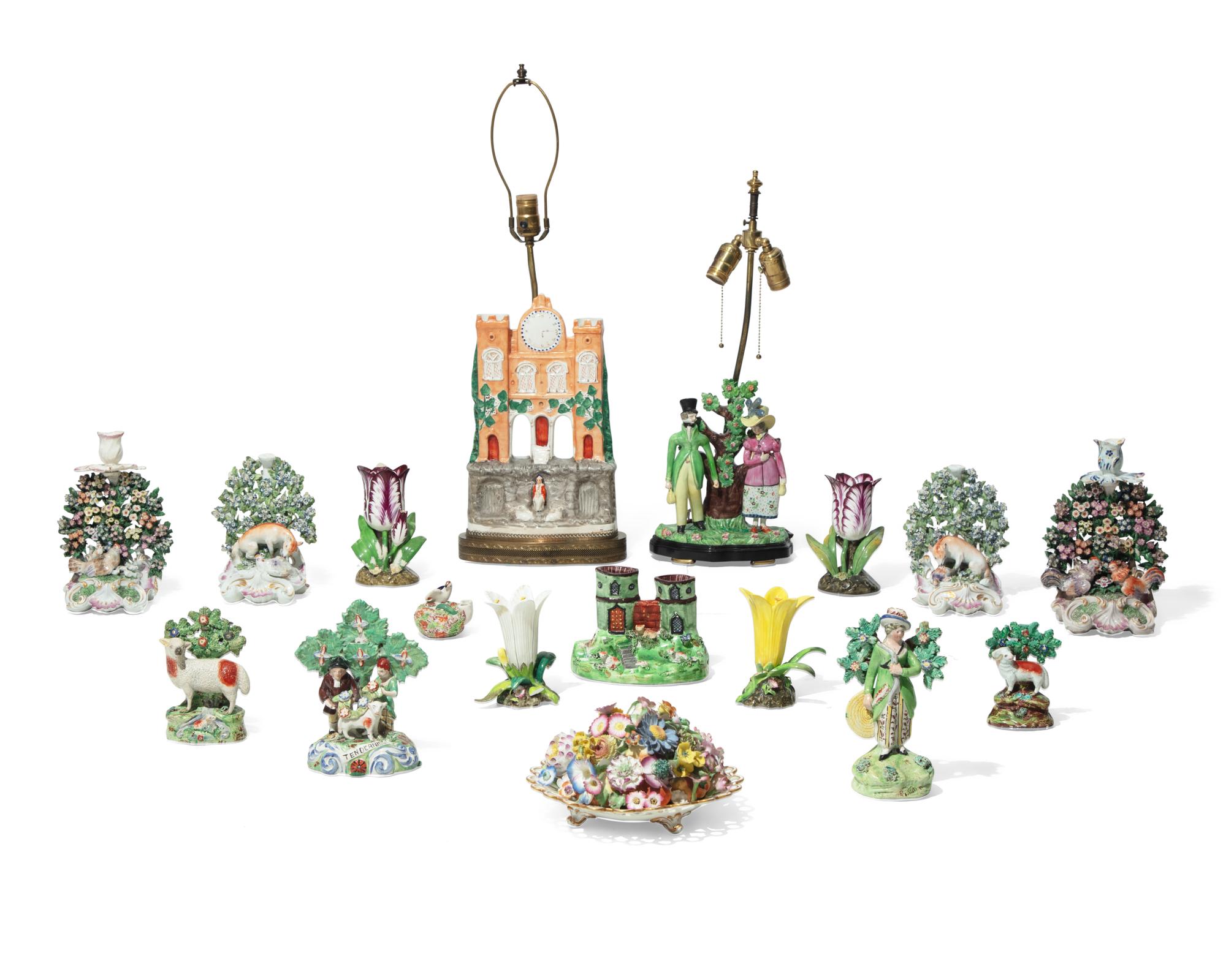 A large collection of seventeen Staffordshire figural groups and floral-form spill vases, late 18th and 19th century