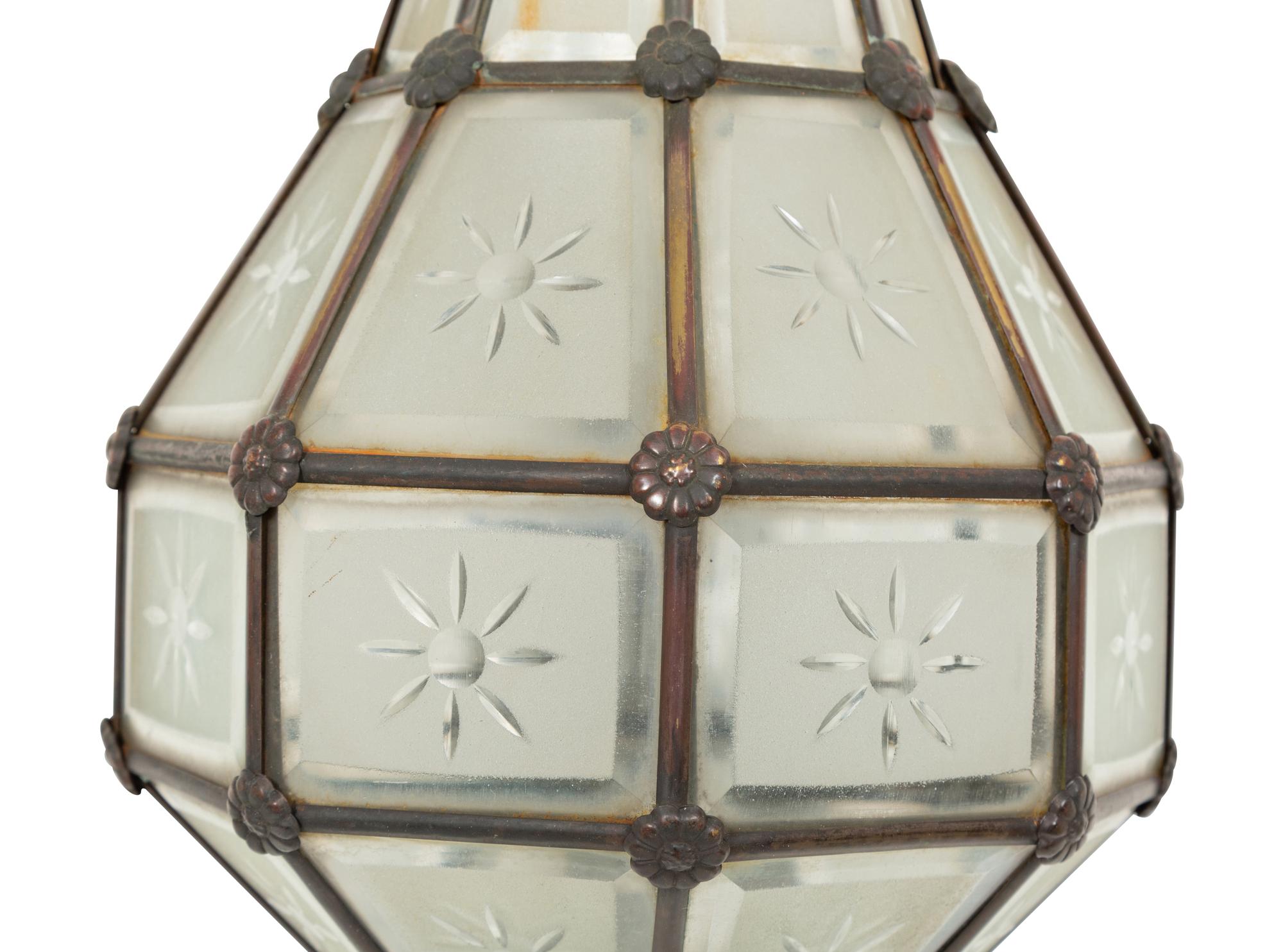 A Bronze and Glass Wall Sconce
