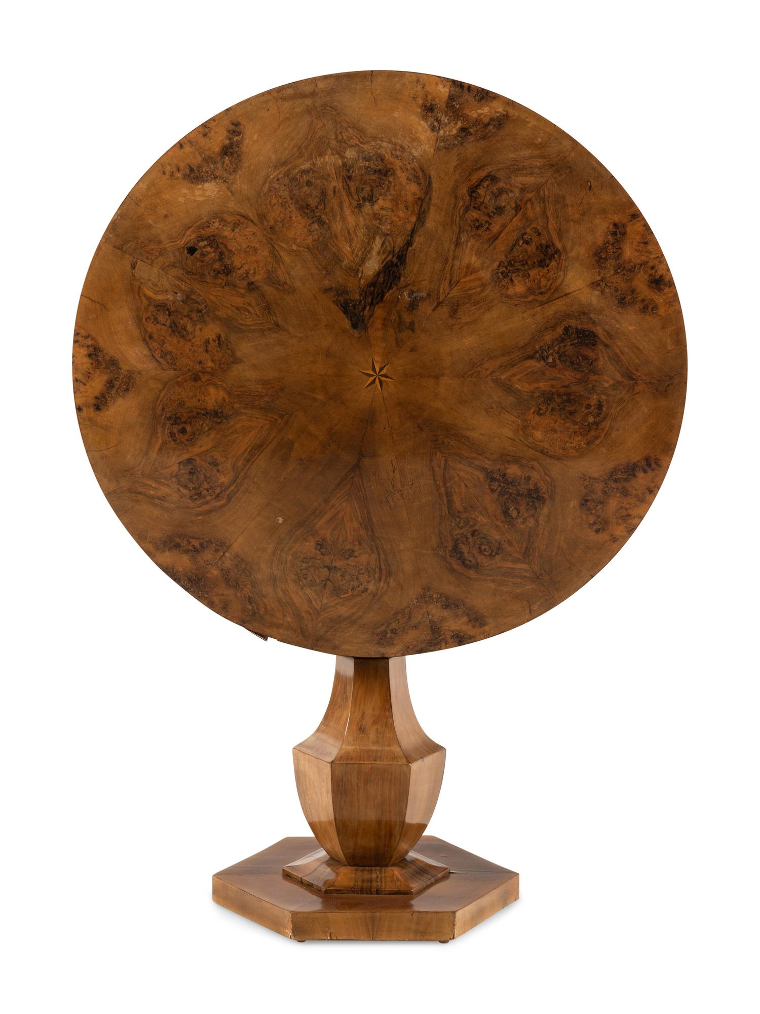 A Biedermeier Walnut Tilt-Top Table