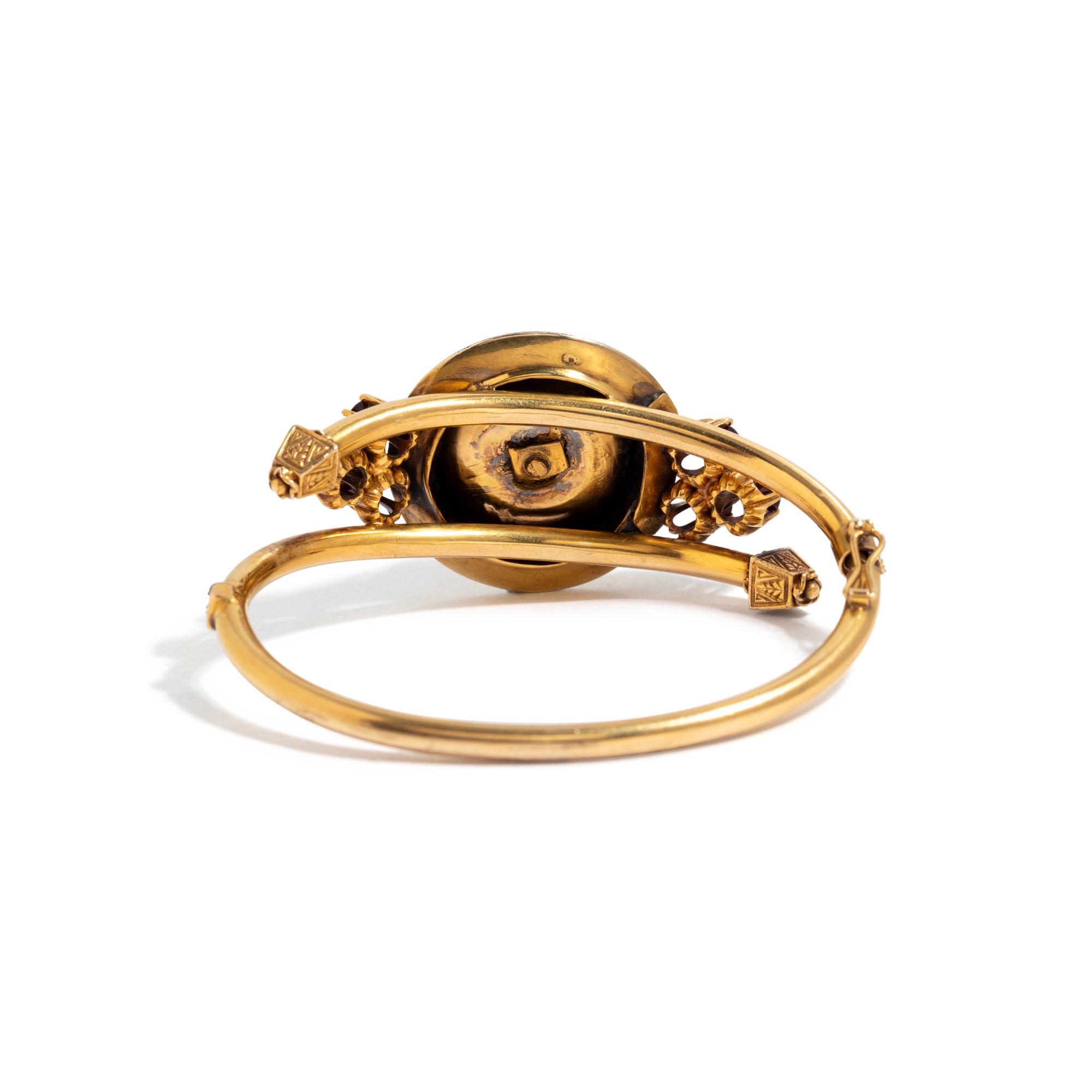 VICTORIAN, YELLOW GOLD, RED GLASS AND GARNET BANGLE BRACELET