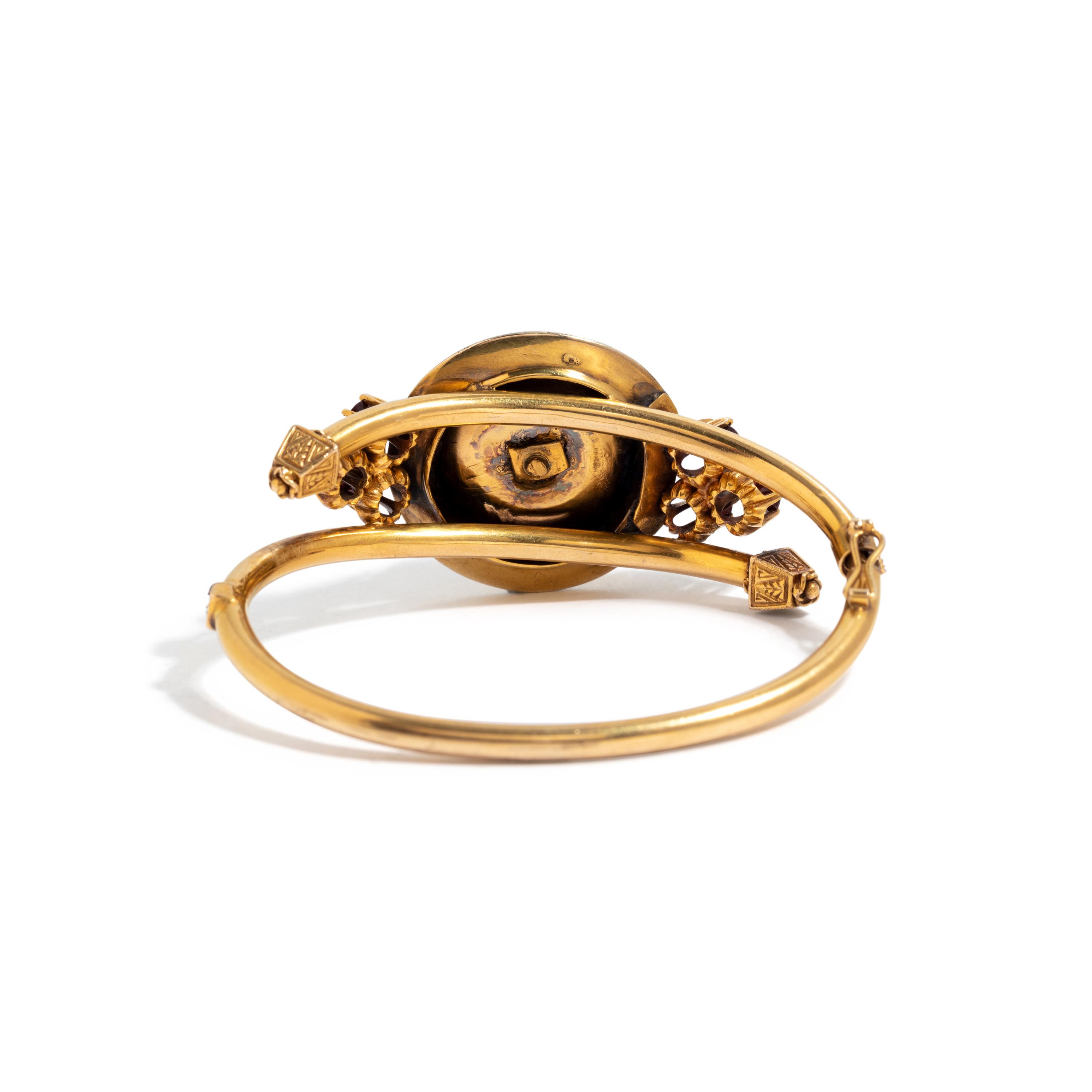VICTORIAN, YELLOW GOLD, RED GLASS AND GARNET BANGLE BRACELET