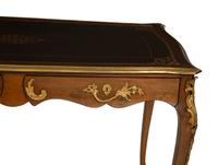 A Louis XV Style Gilt Metal Mounted Walnut Bureau Plat