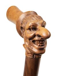 Three Continental Carved Wood Figural Canes