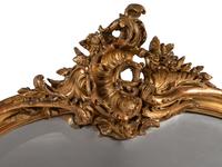 A Pair of Rococo Style Giltwood Mirrors