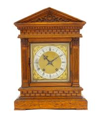 A German Oak Mantel Clock