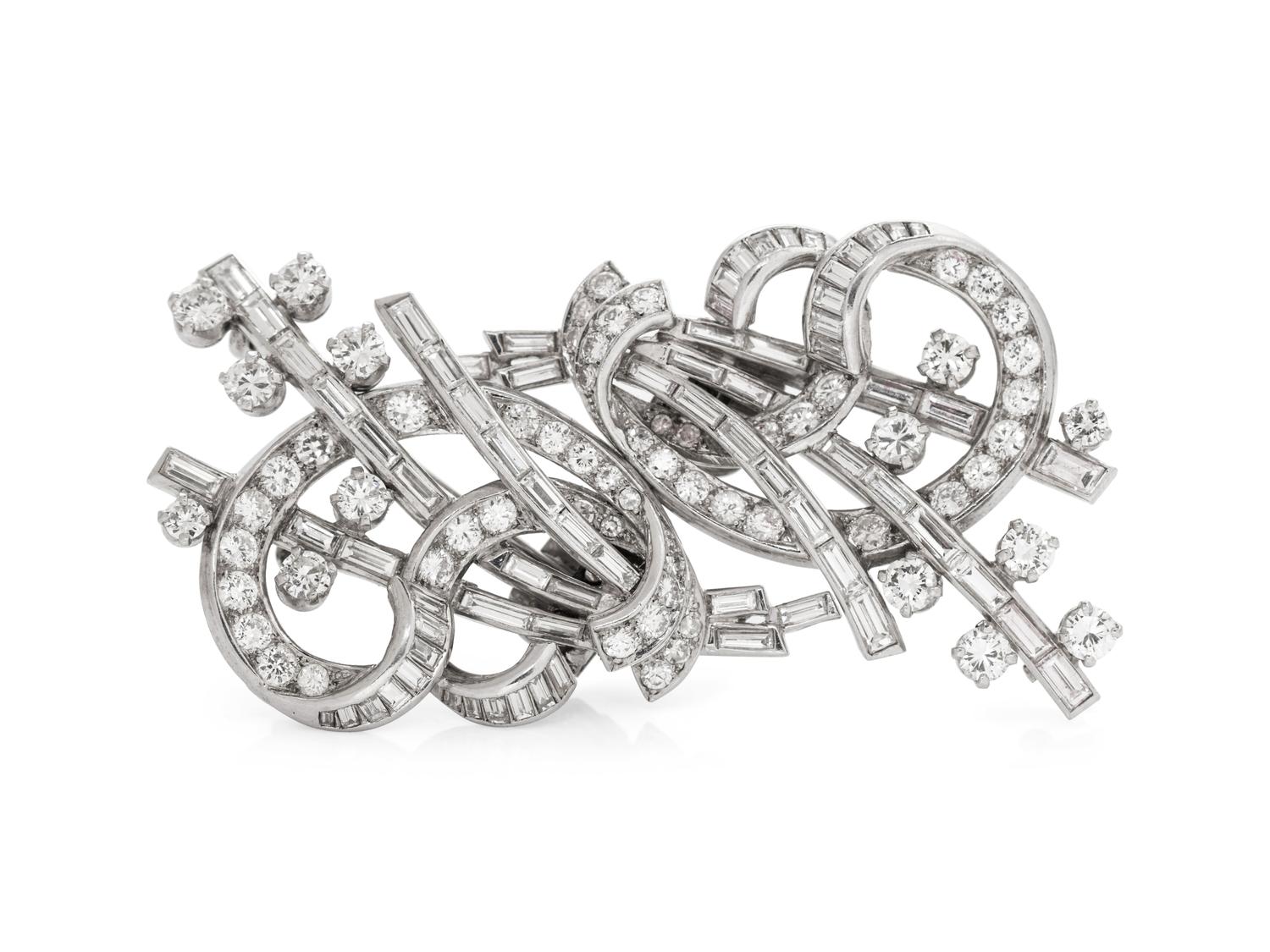 An Art Deco Platinum and Diamond Double Clip Brooch,
