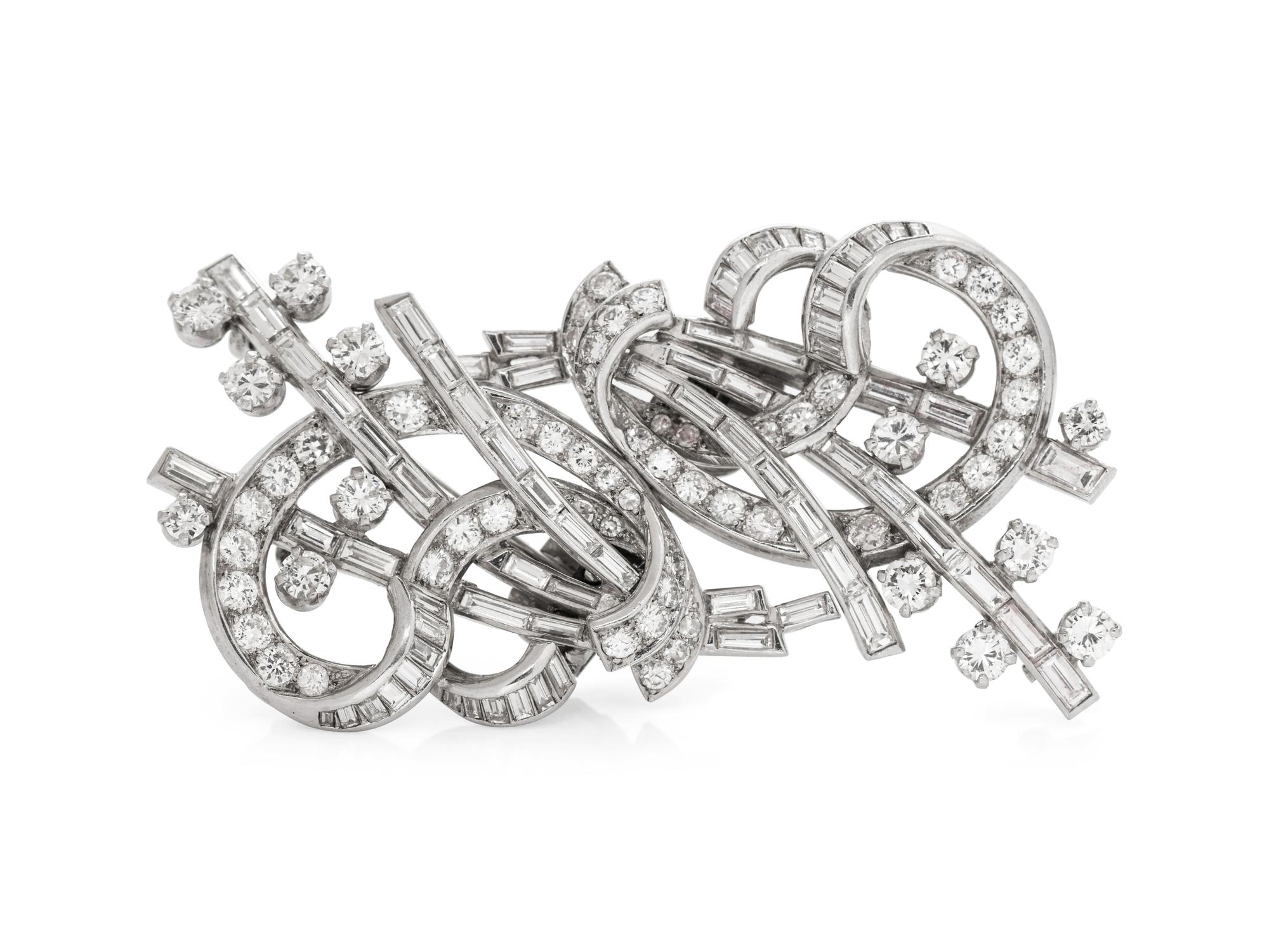 An Art Deco Platinum and Diamond Double Clip Brooch,