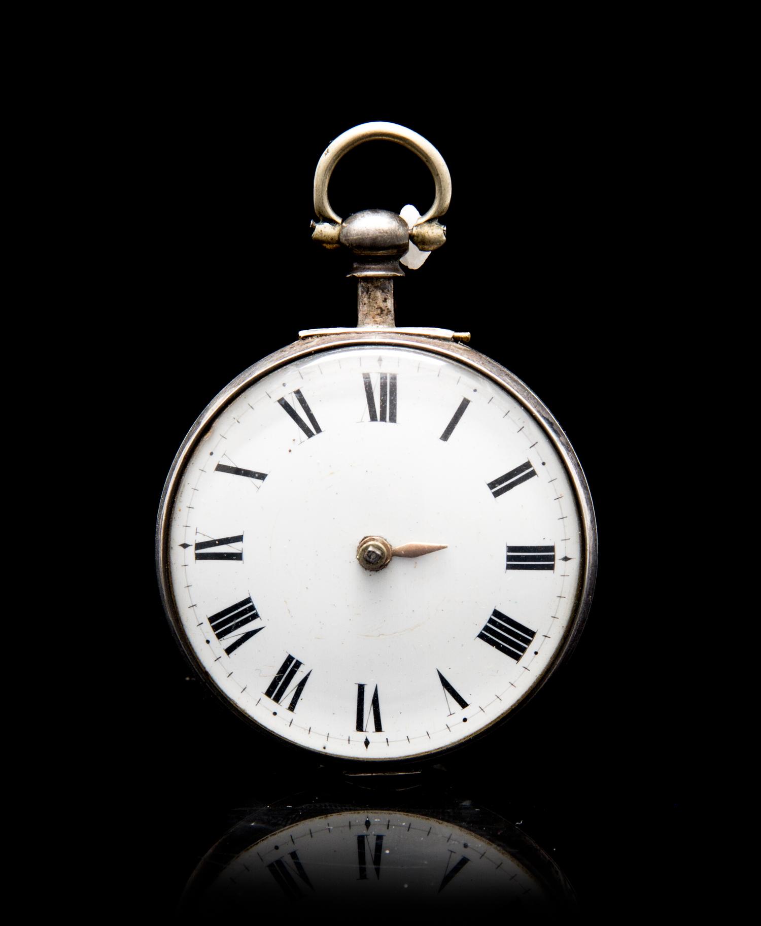 An English Cased Silver Keywound Pocketwatch, , having a white porcelain dial with Roman numerals, gilt feuille hand, key wound and set