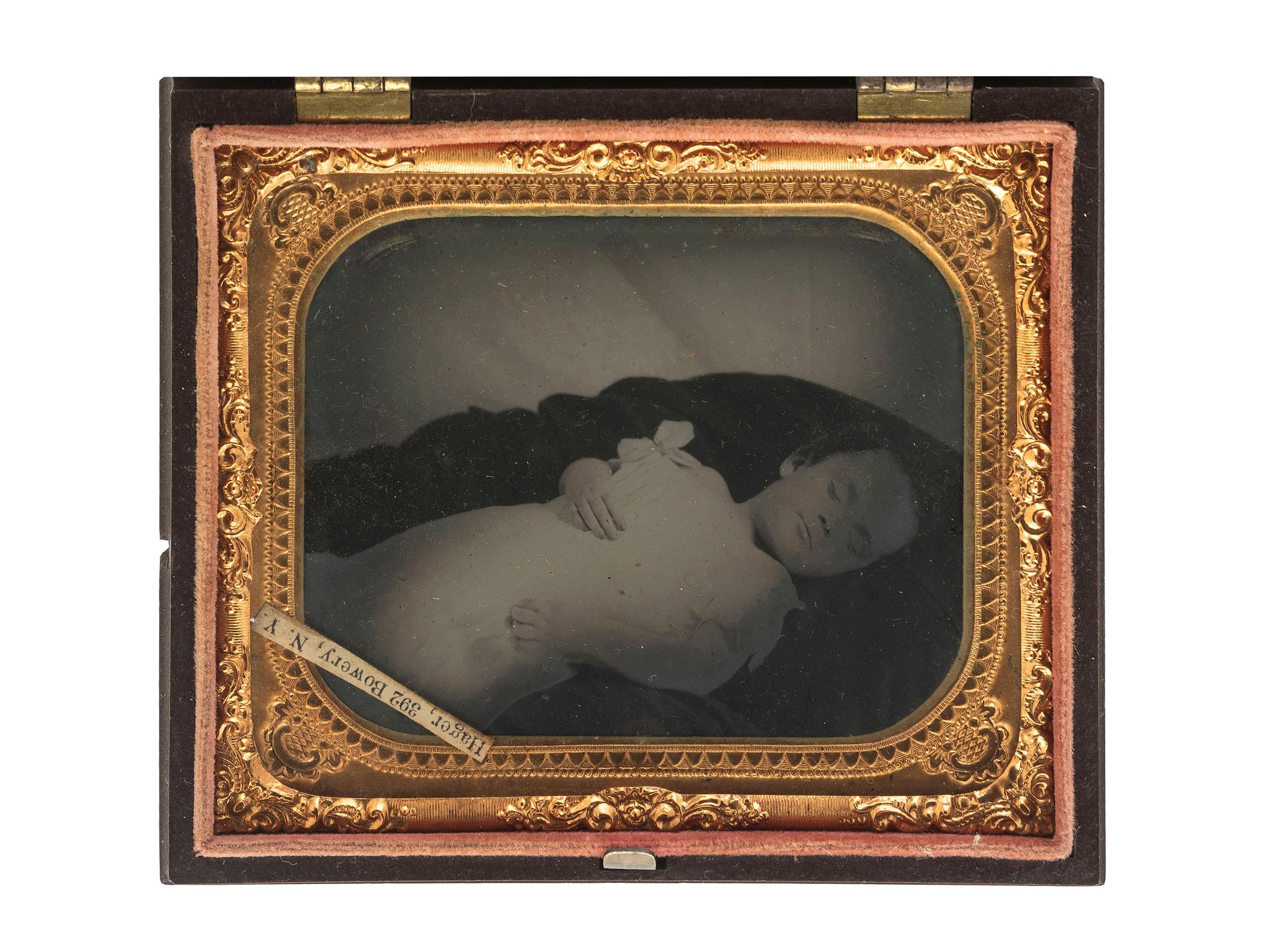 [EARLY PHOTOGRAPHY]. A pair of post-mortem tintypes of children, comprising: