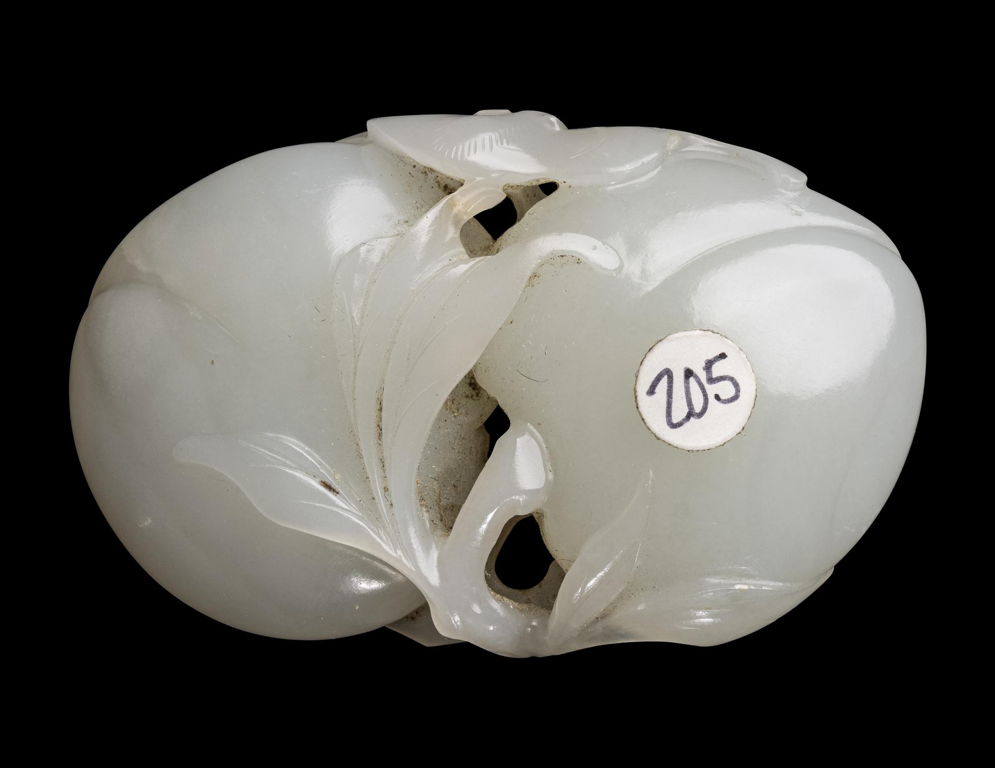 A Chinese Pale Celadon Jade 'Double Peaches' Carving