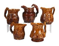 Five Rockingham Glaze Water Pitchers