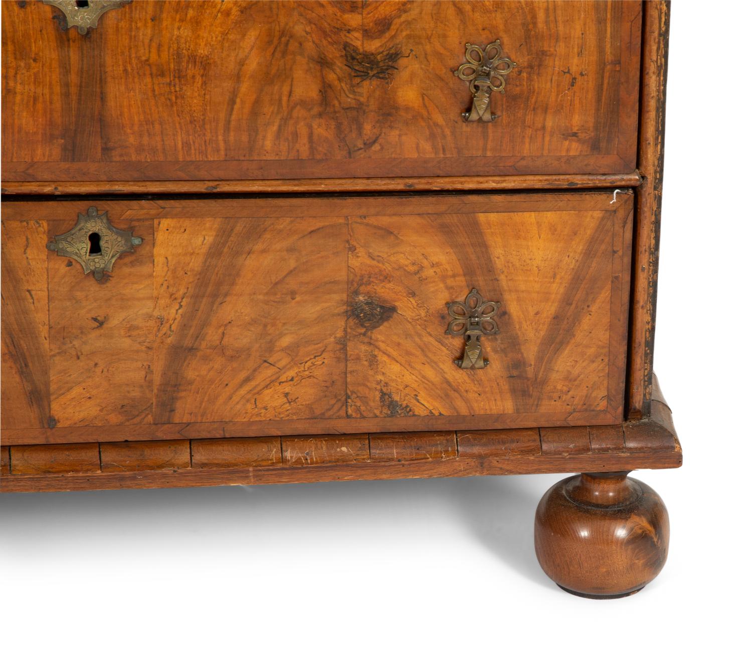 A George II Walnut Chest of Drawers