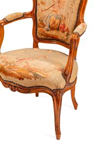 A Pair of Louis XV Tapestry-Upholstered Walnut Fauteuils