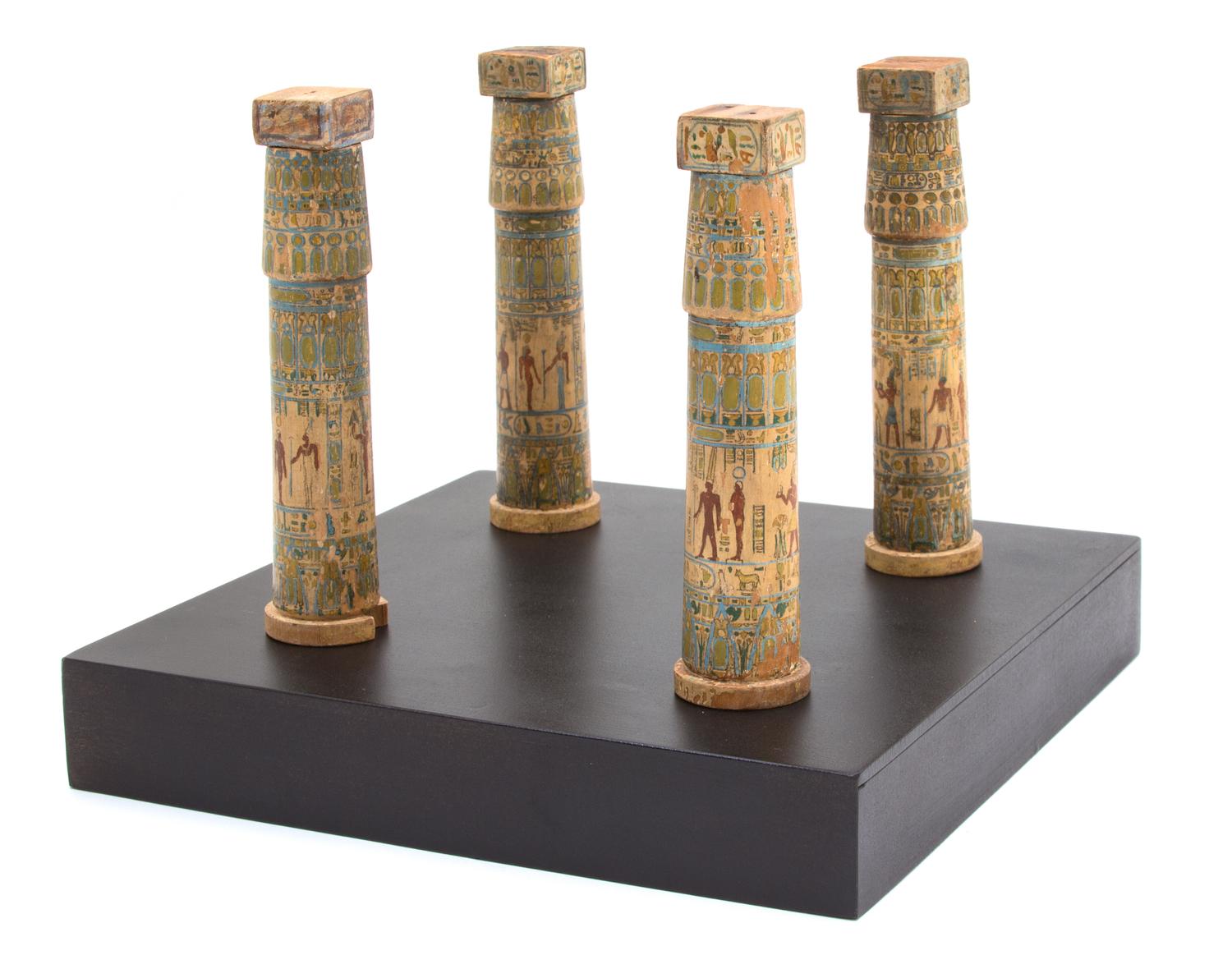 A Group of Four Miniatured Egyptian Painted Columns Height of each column 5 3/8 inches. — CIRCA 19TH CENTURY