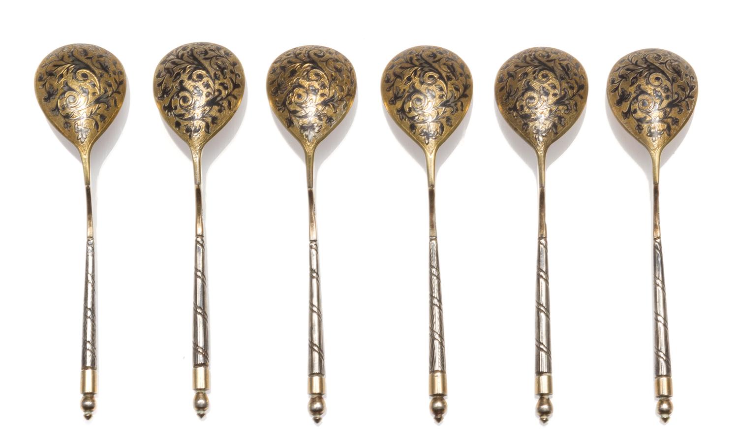 A Set of Six Niello Silver-Gilt Teaspoons, Mark of S. Stroganov, assay mark of Andrey Kovalsky, Moscow, 1846, each having a spherical f