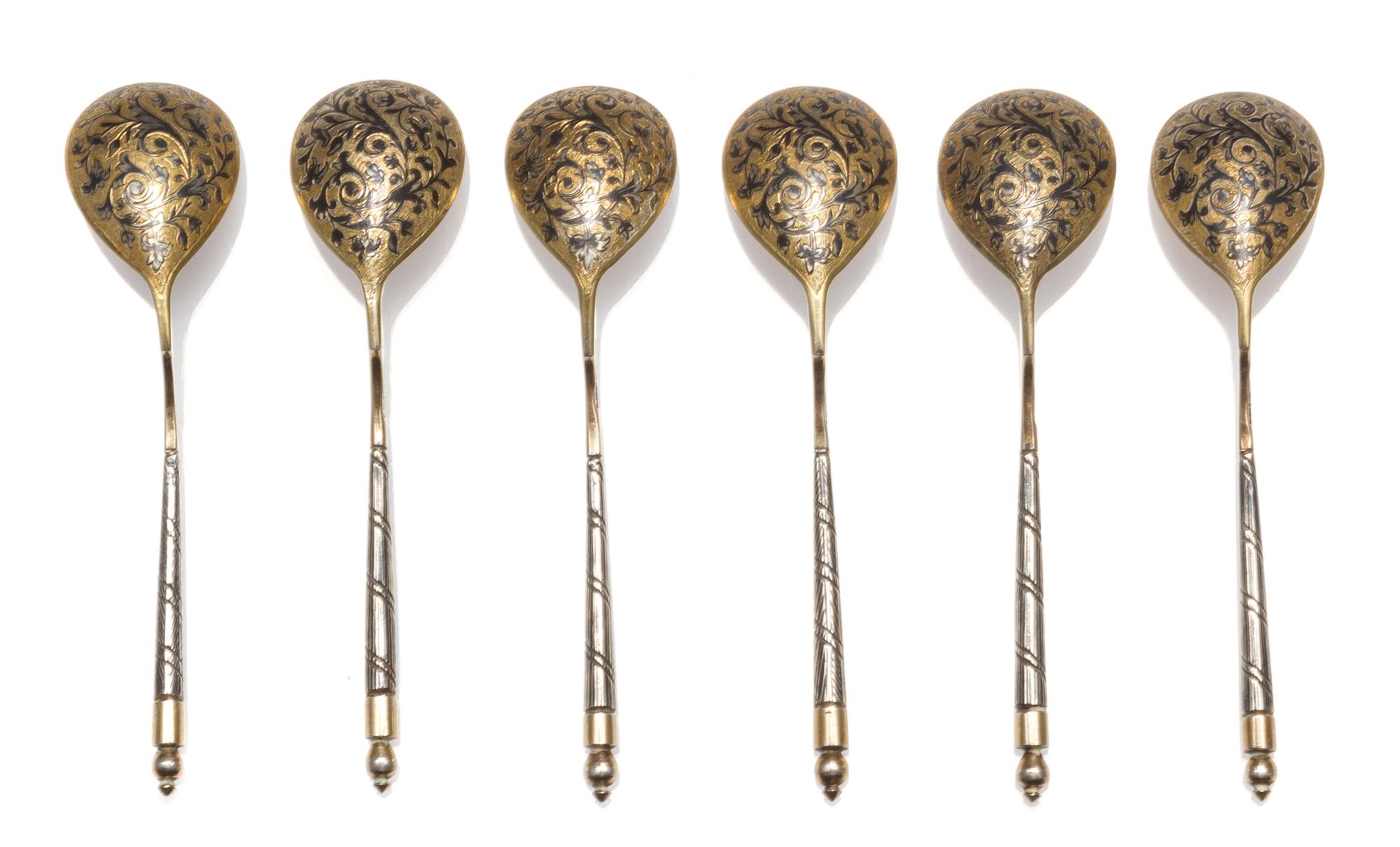 A Set of Six Niello Silver-Gilt Teaspoons, Mark of S. Stroganov, assay mark of Andrey Kovalsky, Moscow, 1846, each having a spherical f