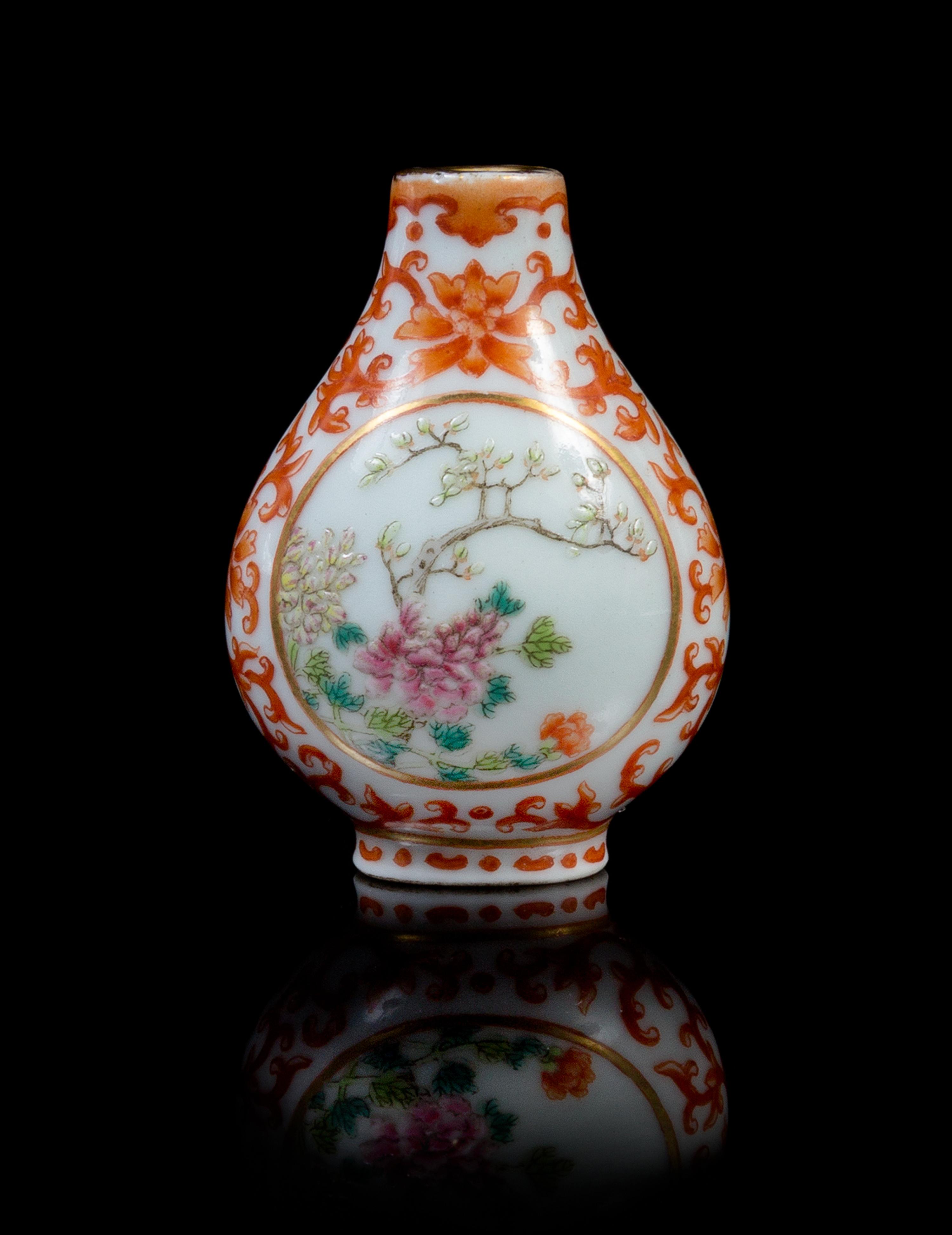 A Famille Rose, Iron Red and Gilt Decorated Porcelain Snuff Bottle Height 2 1/2 inches.