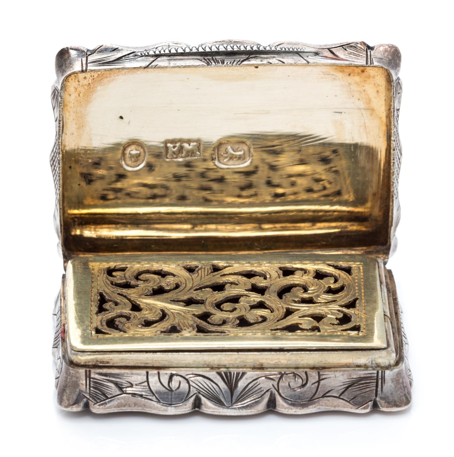 A Victorian Silver Vinaigrette, Frederick Marson, Birmingham, 1859, the case with floral, foliate, C-scroll and geometric decoration, t