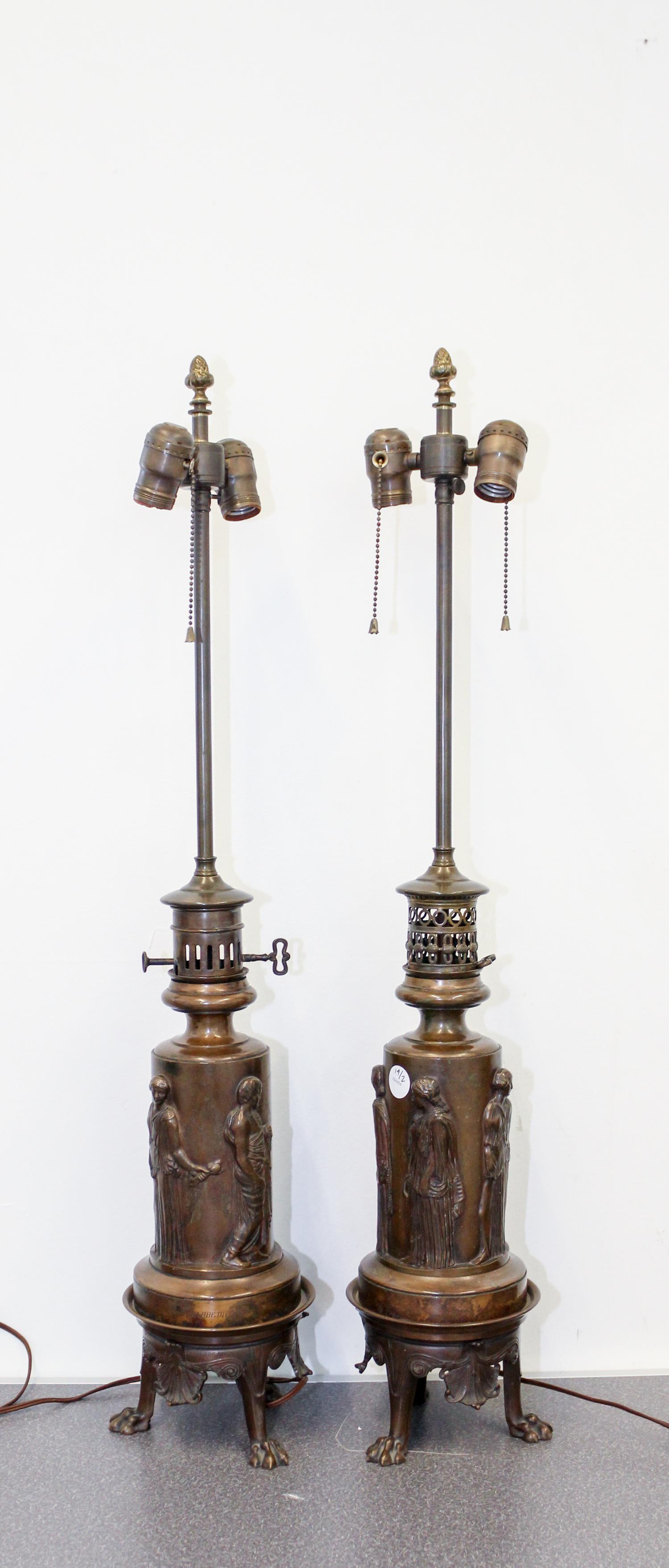A Pair of Neoclassical Bronze Oil Lamp Bases Height overall 33 1/4 inches. — 19TH CENTURY