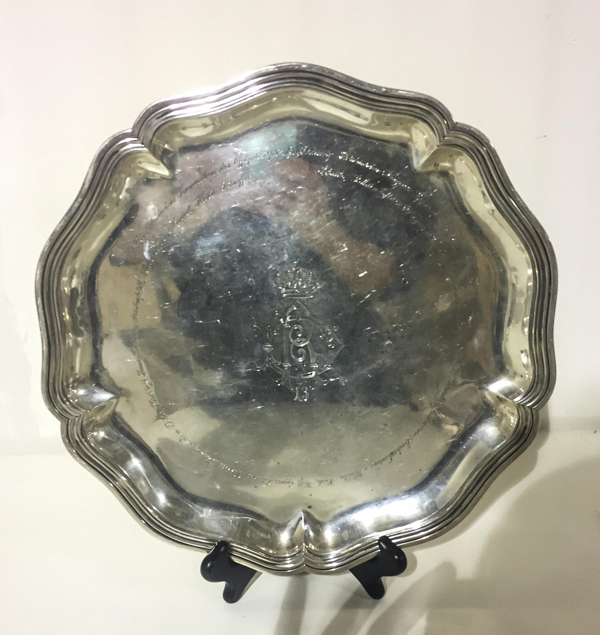 A German Silver Presentation Tray, Bruckmann & Sohne, Heilbronn, of shaped circular form with reeded edges, engraved with an inscriptio