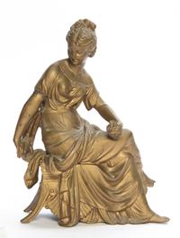A Figure of a Seated Lady Height 11 1/2 inches.