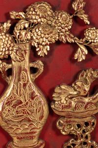 A Set of Four Chinese Gilt and Red Lacquered Wood 'Four Seasons' Panels